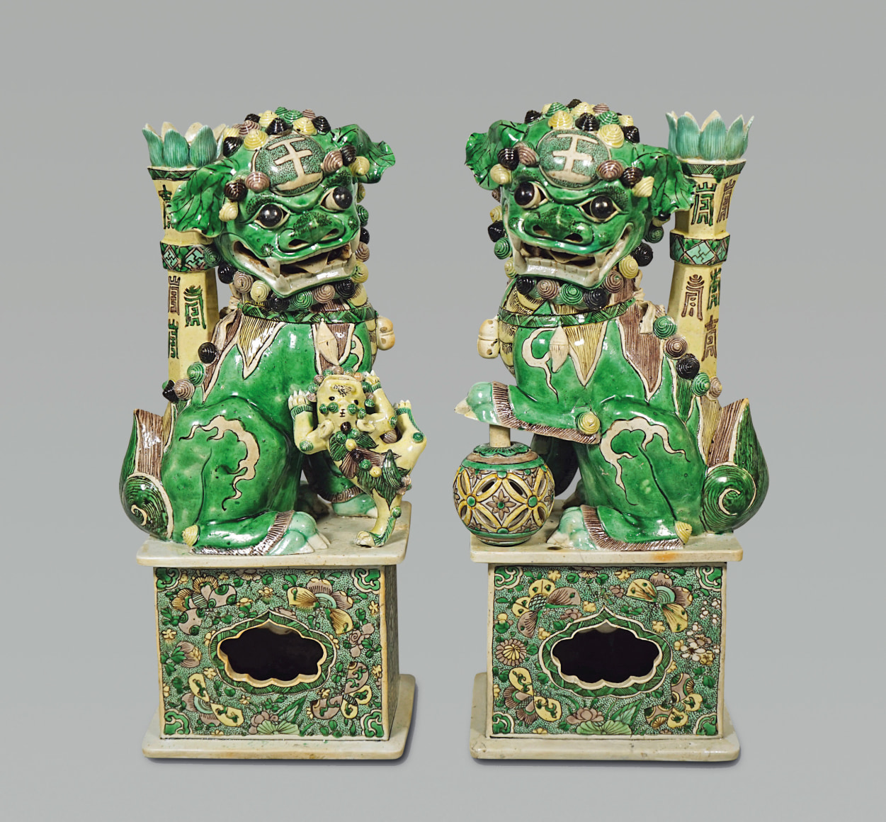 Pair of Large Chinese Verte Glazed Biscuit Porcelain Fu Lions