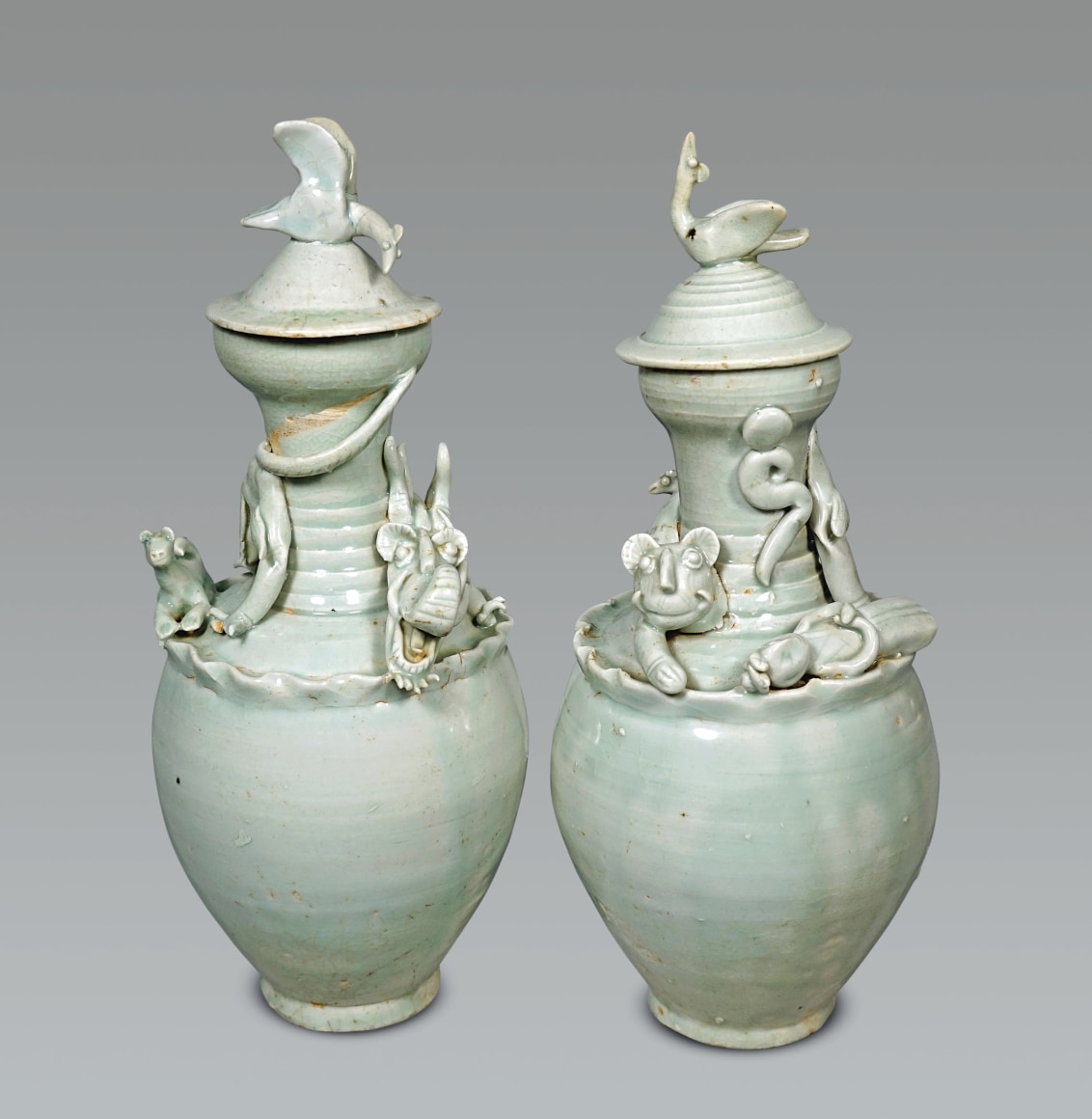 Fine and Rare Pair of Chinese Qingbai Glazed Vases and Covers
