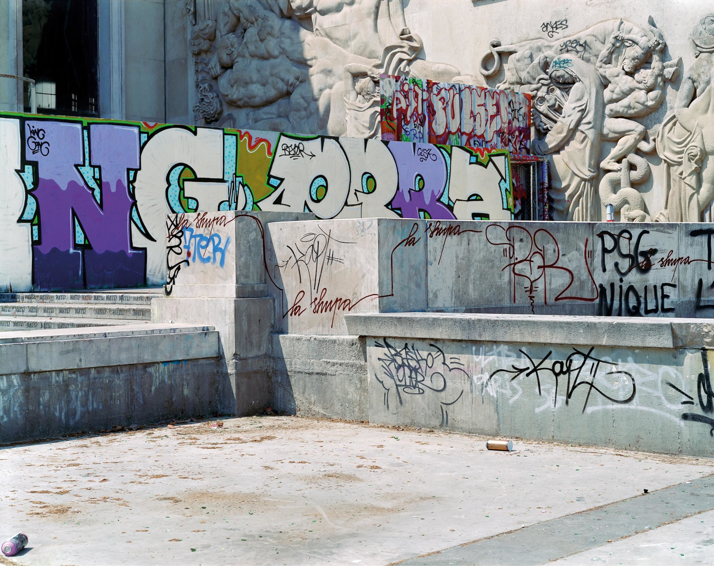 Jade Doskow  Paris 1937 World's Fair, Exposition Internationale des Arts et Techniques dans la Vie Moderne, Graffiti, Palais de Tokyo, 2007  Digital Chromogenic Print  20h x 25w in, photograph of a museum courtyard with graffiti/spray paint