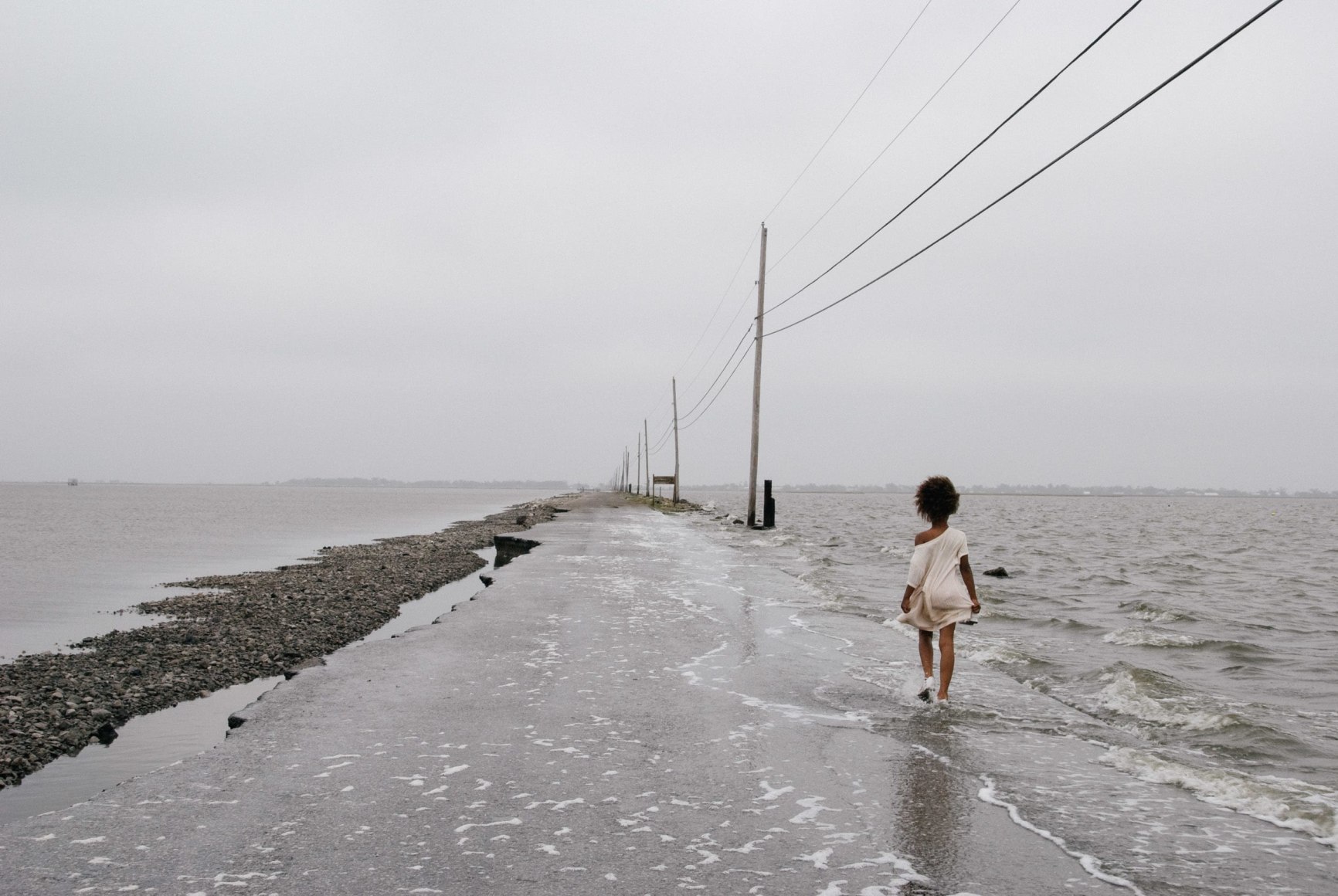 Stacy Kranitz  Island Road, 2010, from the series Isle de Jean Charles, Louisiana, 2010  Archival Pigment Print  16h x 2, Edition 1 of 34w in