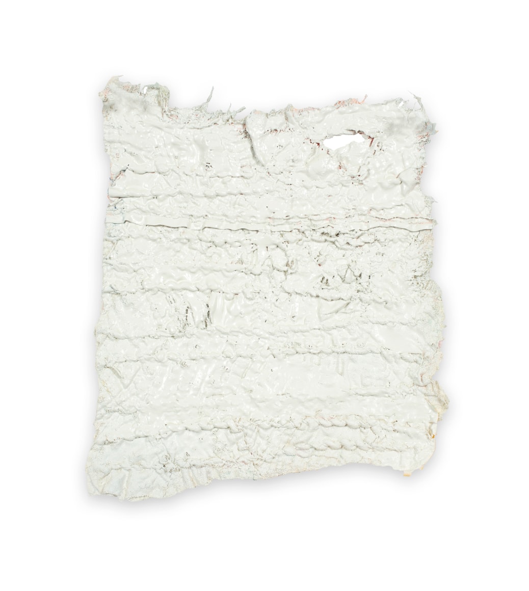 Rachel Meginnes  Overlay, 2019  Deconstructed quilt, hand stitching, acrylic and spray paint  9 1/2h x 8w in, quilt fragment painted white with a small orange reflection in the top right corner.