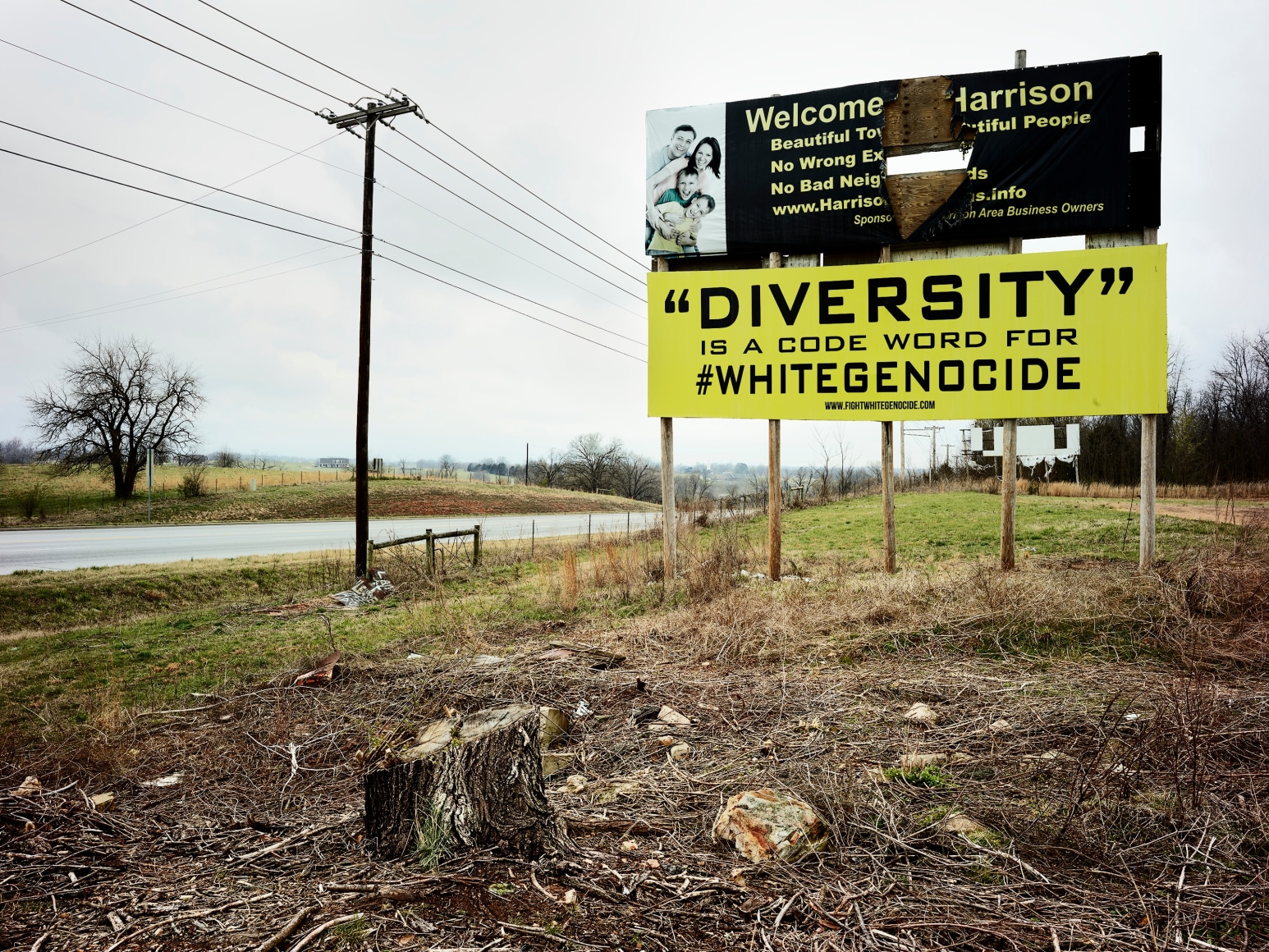 Photograph of billboard with text