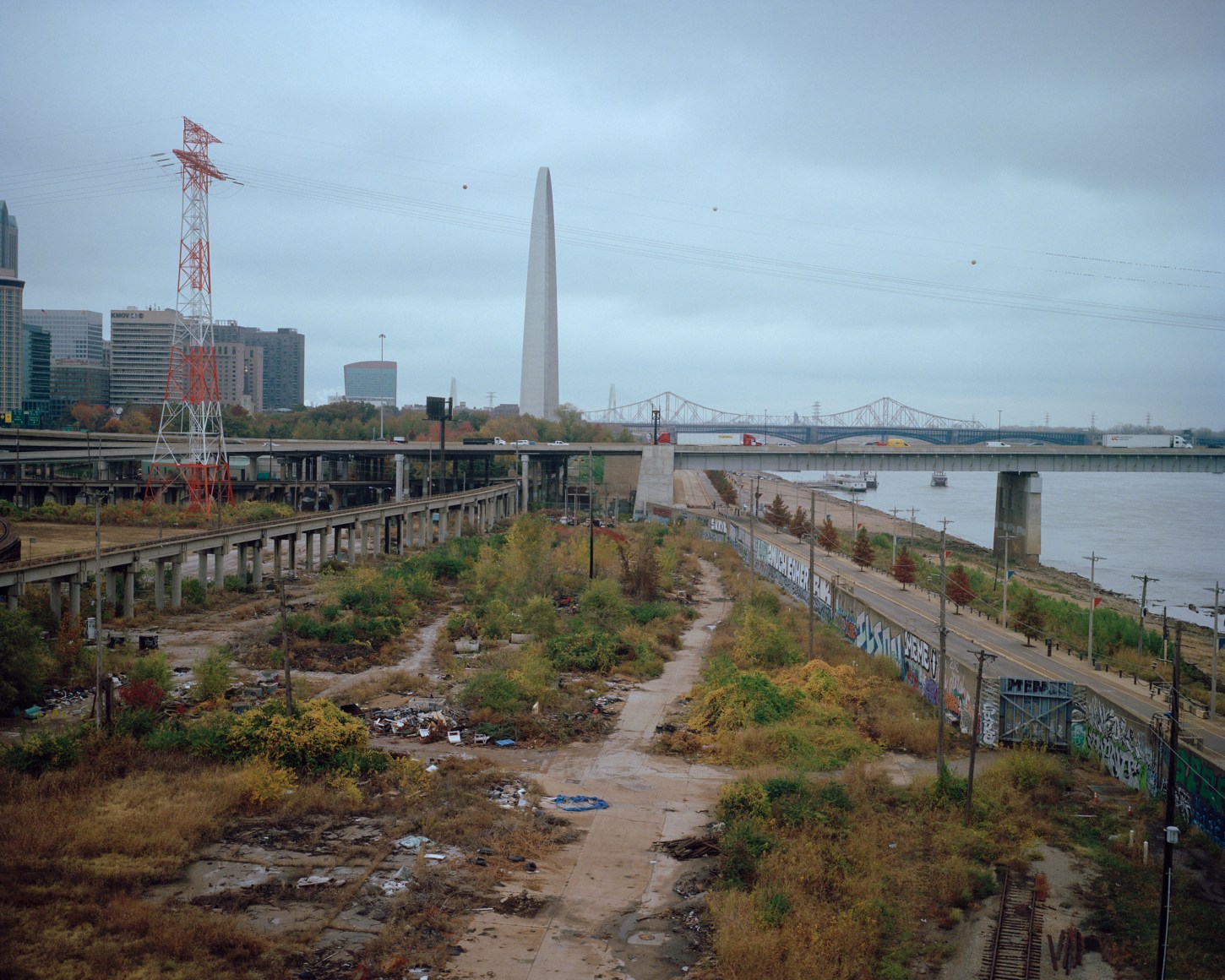 Industrial landscape from train window, by McNair Evans