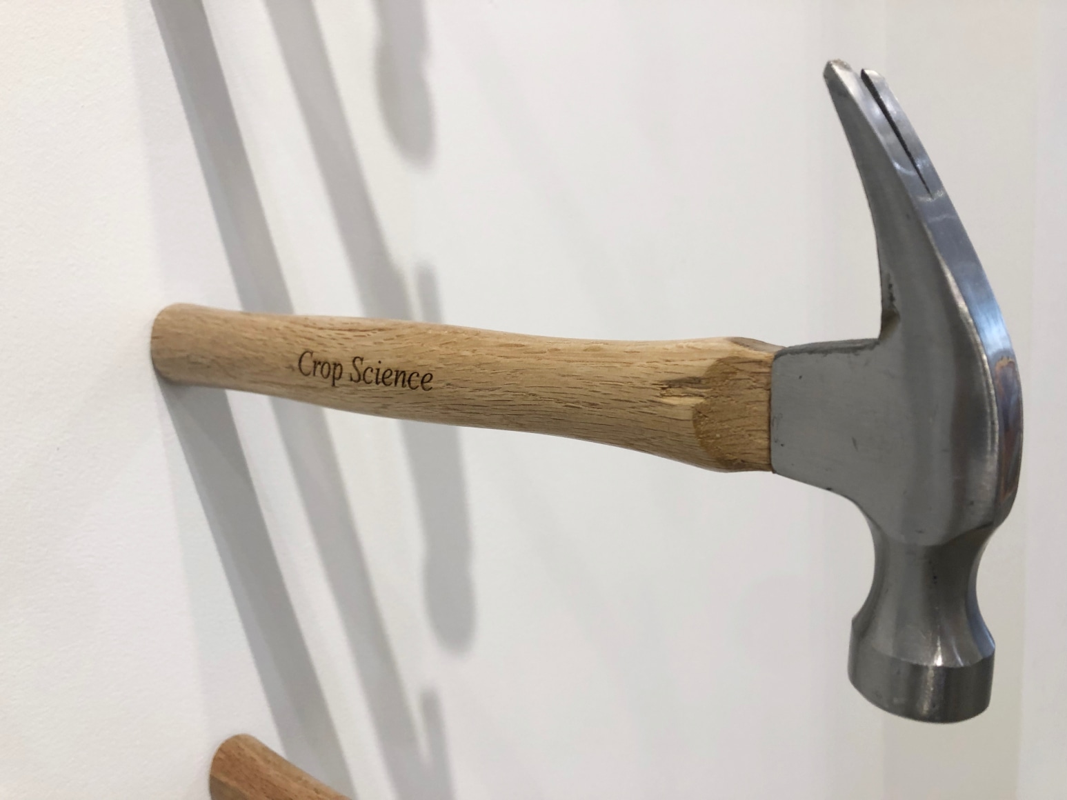 Detail image of engraved hammer installation by Kirsten Stolle