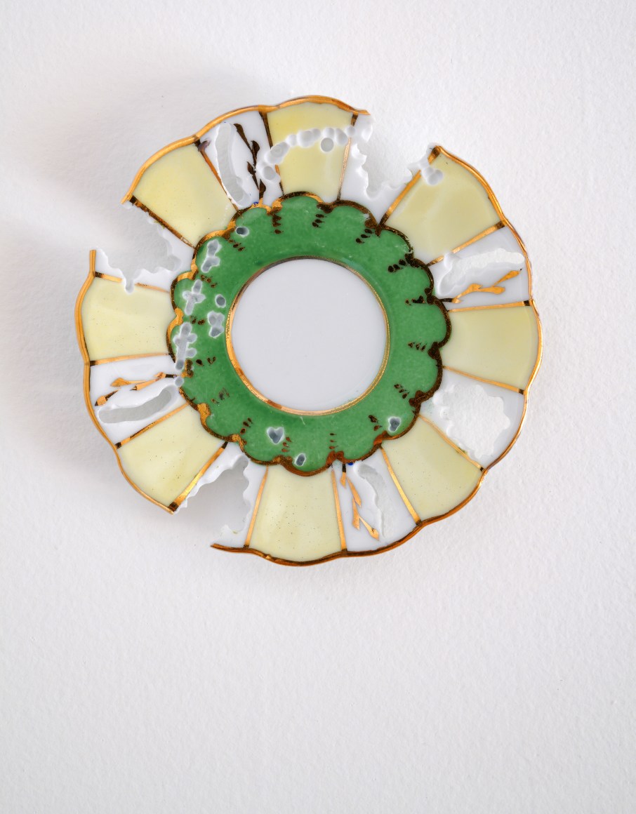 Green and yellow Limoges plate with floral detail removed