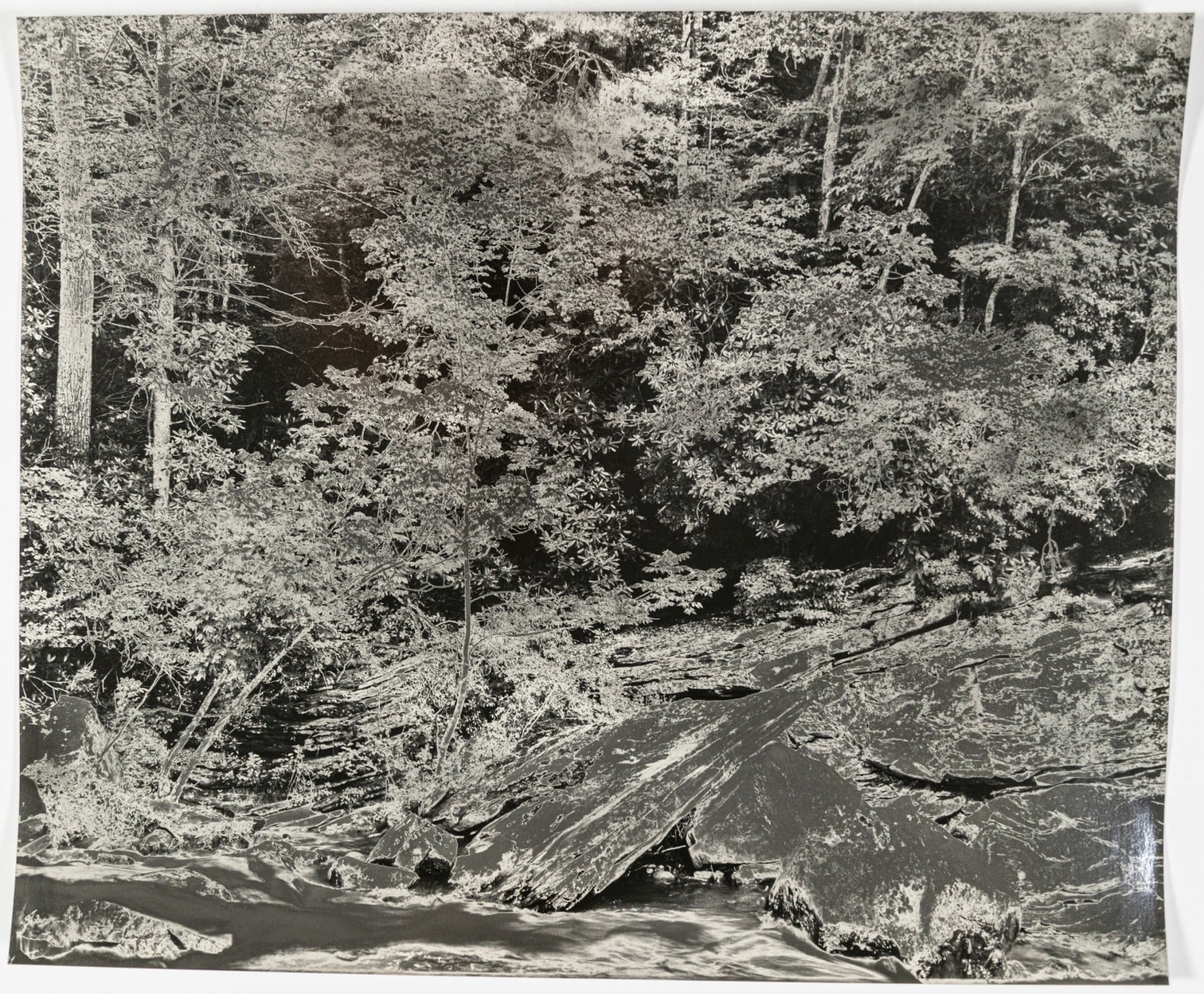 Gesche Würfel  Linville Falls, NC (1), version 1, 2020-2021  Solarized gelatin silver print on glossy fiber paper  20h x 24w in 50.80h x 60.96w cm  GW_015, Black and White, Landscape, Solarized to create an eerie atmosphere through reversed tones