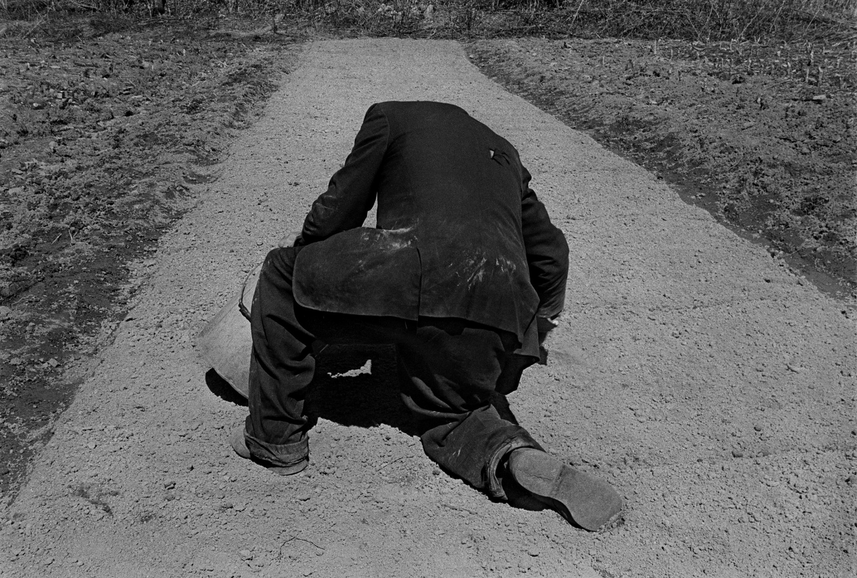 Doug Wallin Sowing Tobacco Bed, Sodom Laurel, Madison County, NC,  1978 Printed 2016 Archival pigment print 13.5 x 20 inches Edition of 12