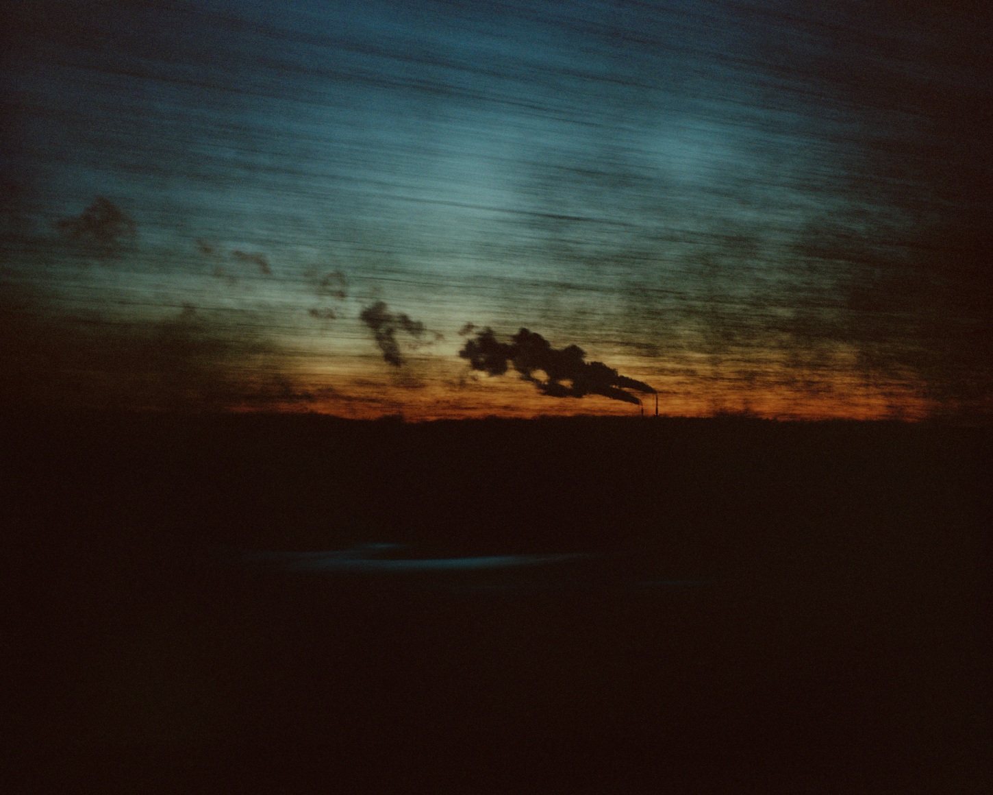 Landscape / skyscape with smoke stacks