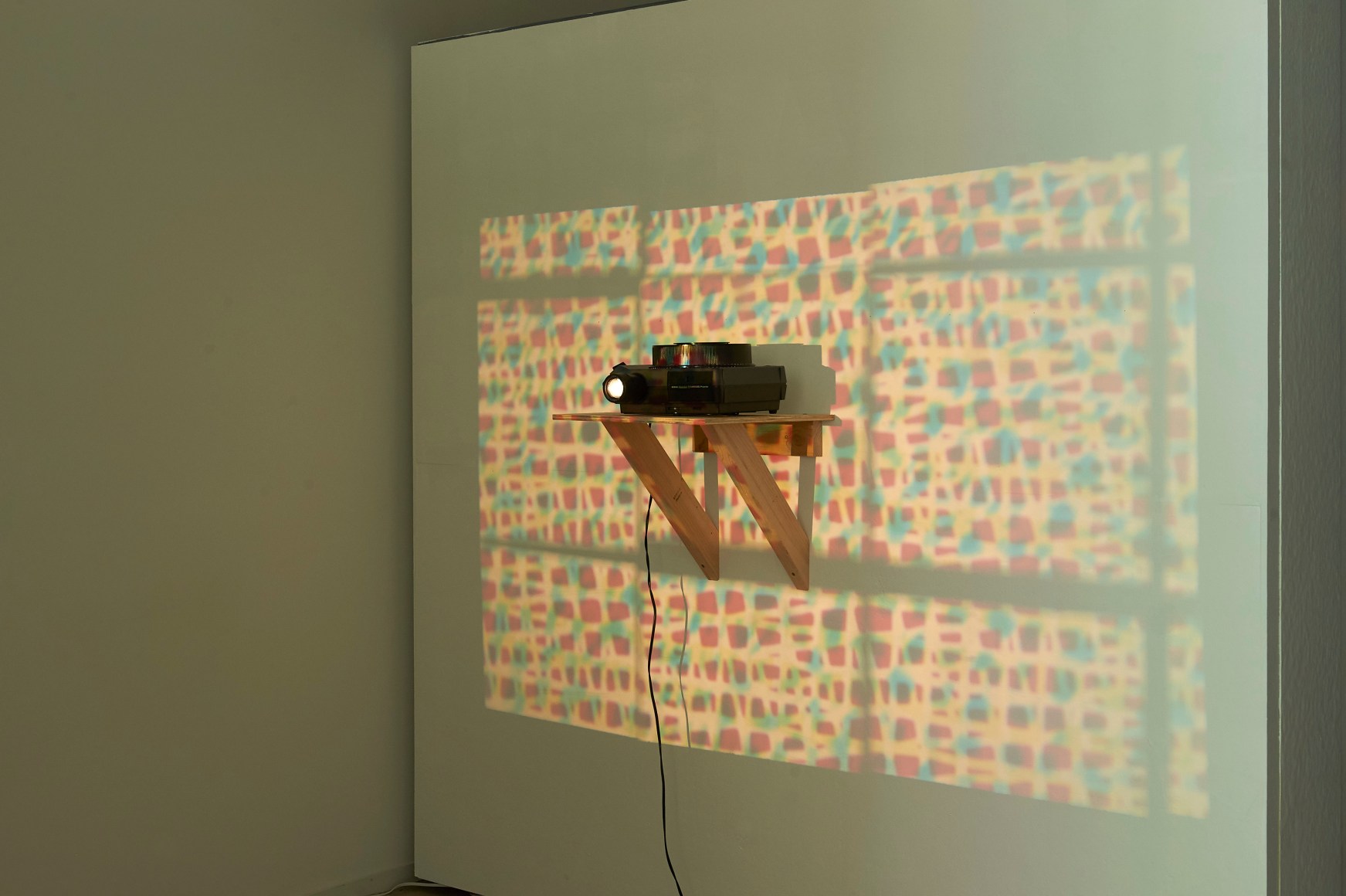 Reflected Projections Projecting Reflections, 2020  Slide projector, mirrors, transparency slides  Dimensions variable  Unique, Wall projection of large scale geometric abstractions