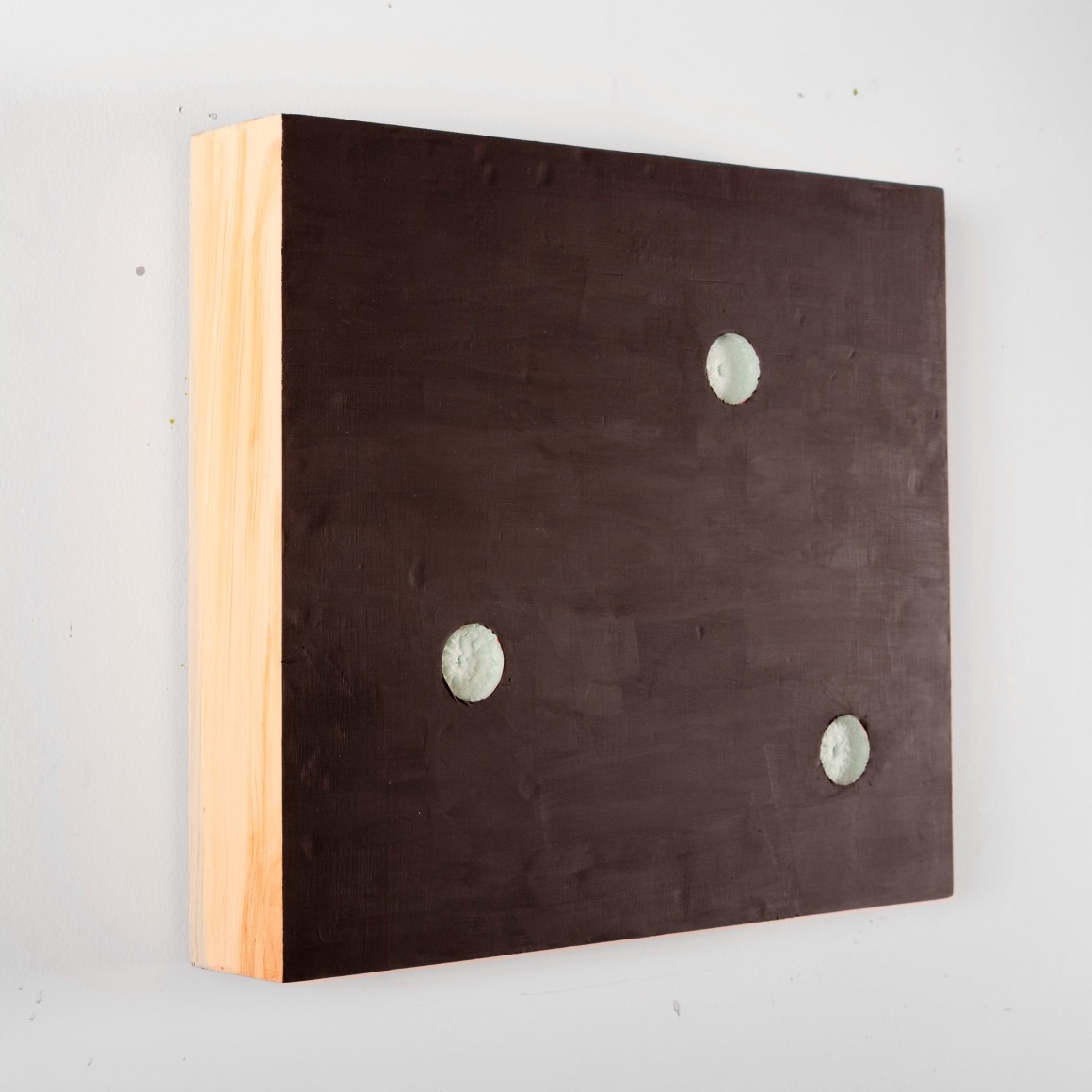 Hand-painted Styrofoam with holes. By Hannah Cole.