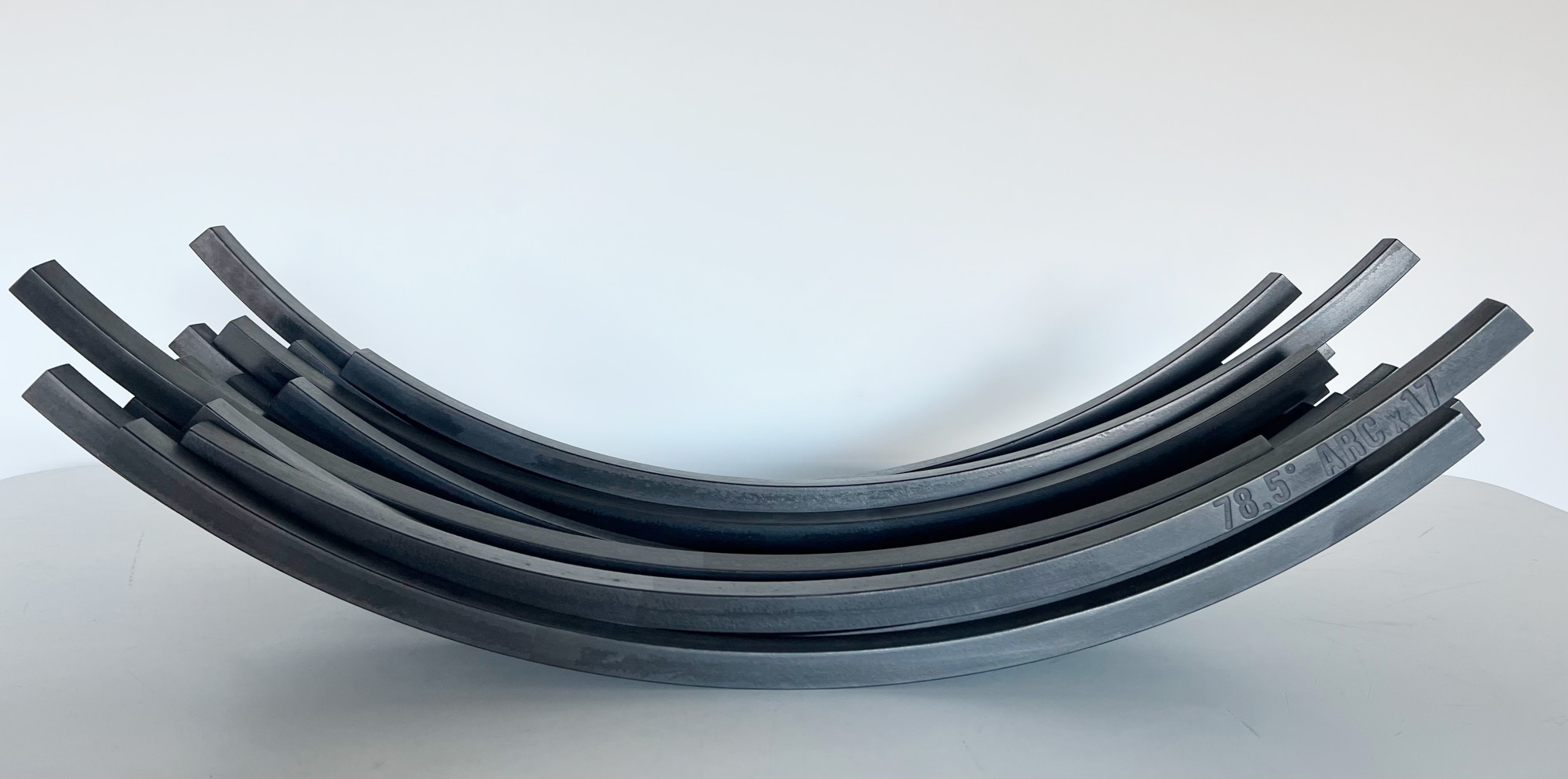 Bernar Venet 78.5 Arc x 17, 2008 Rolled steel with black patina 11 1/4 x 40 x 13 inches