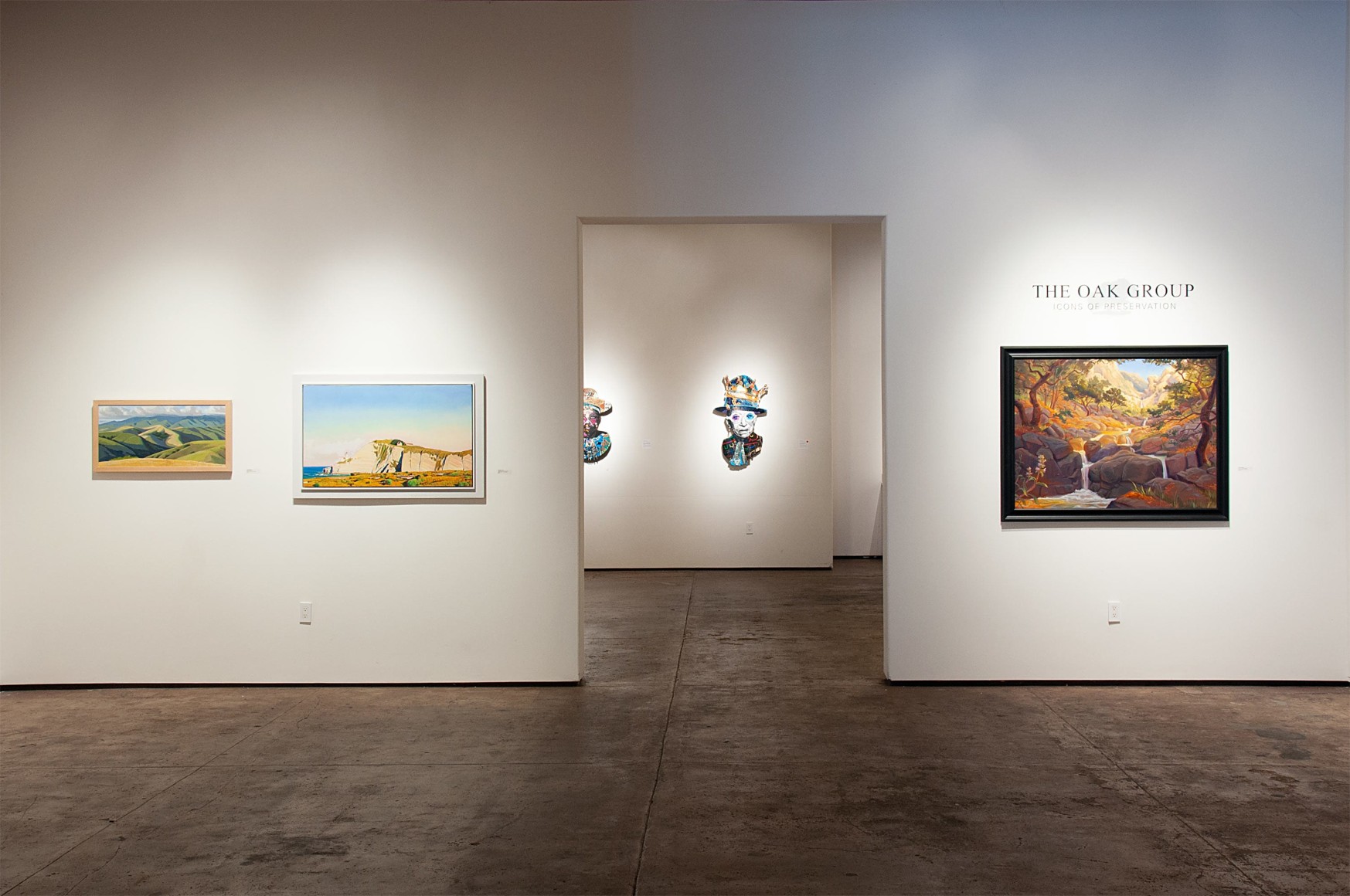 THE OAK GROUP: Icons of Preservation installation photograph with John Iwerks, Michael Drury, and Kevin Gleason with Inga Guzyte in the background