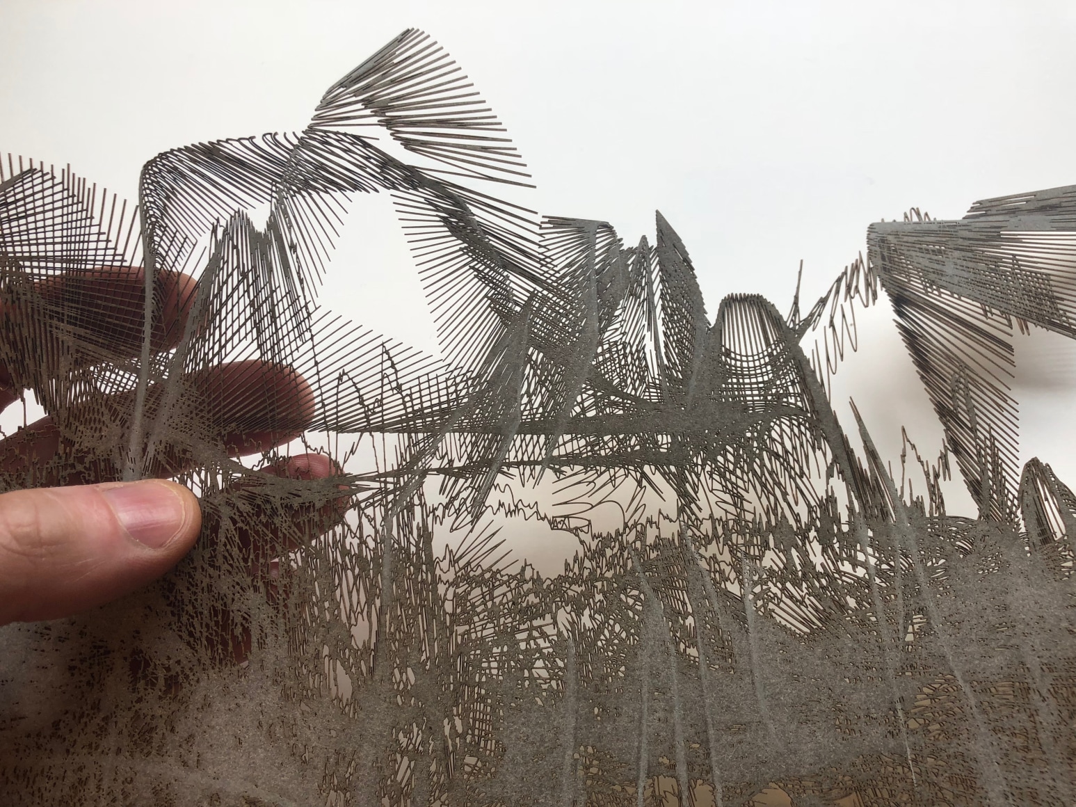 Gustavo D&iacute;az, (detail), 2019. Cut paper, 59 1/16 x 169 1/4 in.