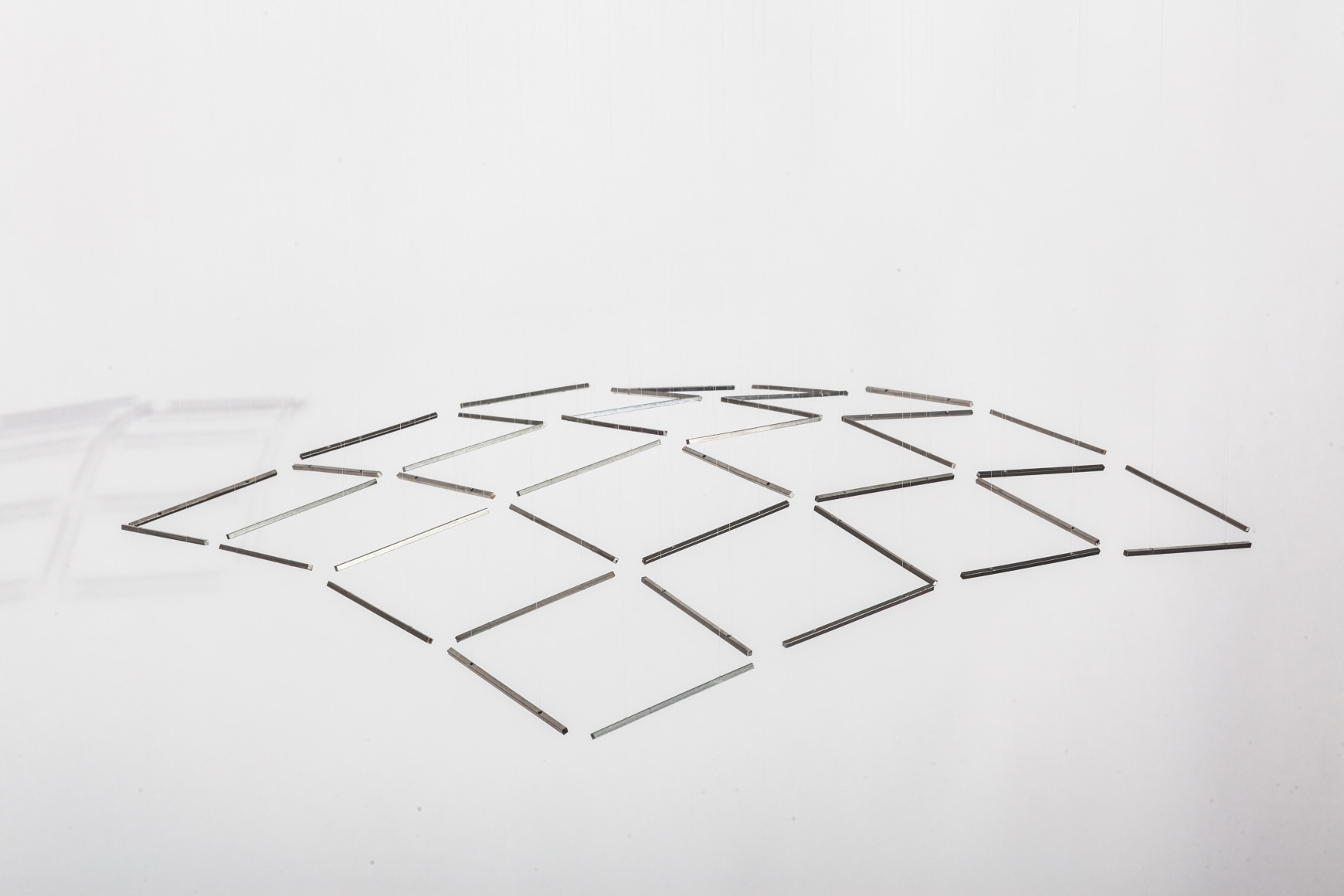 Elias Crespin, 4Nte Inox Quadra, 2013. Stainless steel, nylon, motors, and electronic interface, 19 11/16 x 19 11/16 in. (50 x 50 cm.)