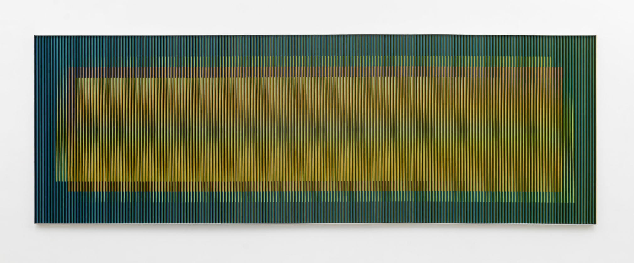Carlos Cruz-Diez, Physichromie No 2376, 1998. Chromography on Aluminum, 70 ⅞ x 212 ⅝ x 2 &frac12; in. (180 x 540.1 x 6.3 cm.)