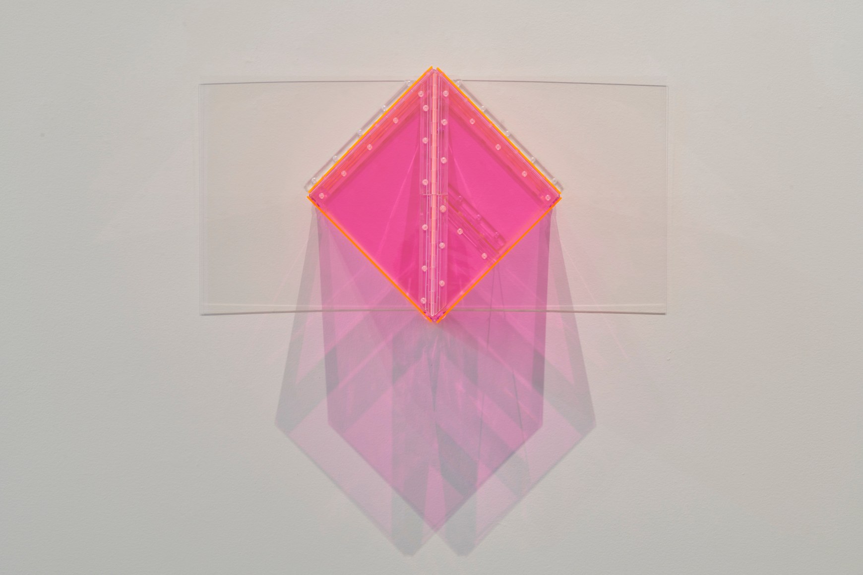 Marta Chilindron. Pink Wall Cube, 2007, fluorescent pink and clear acrylic and hinges, 15 x 31 x 11 in.