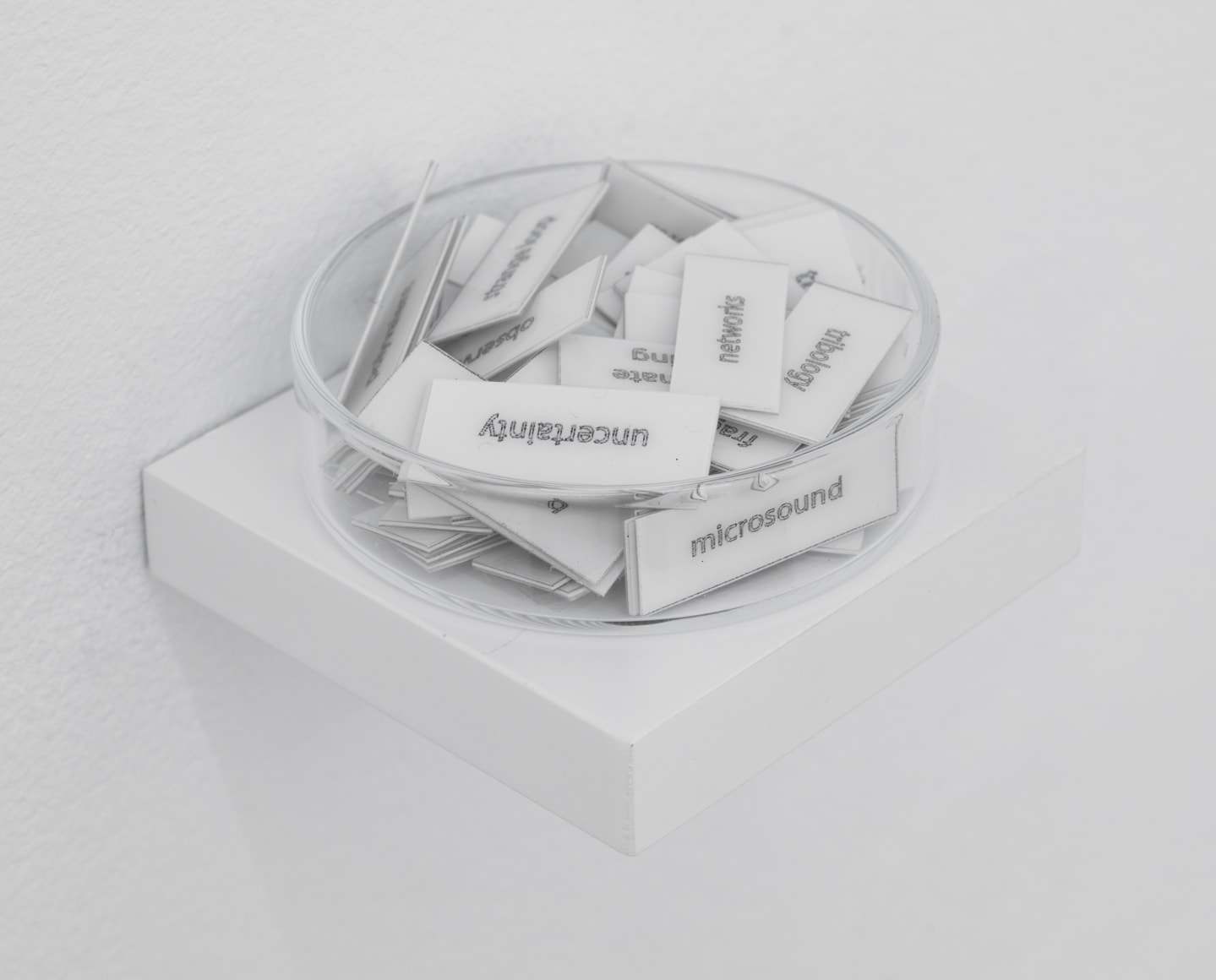 Un evento azaroso es el comienzo de una secuencia azarosa , 2018. Paper and glass. 1 1/8 x 2 1/2 x 2 1/2 in. (2.9 x 6.4 x 6.4 cm).