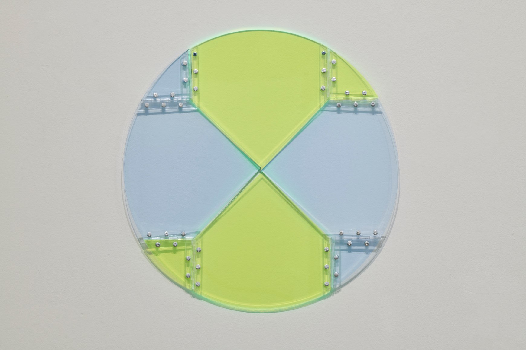 Marta Chilindron. Convertible Circle, 2014, fluorescent green and blue acrylic and hinges, 30 in. diameter.