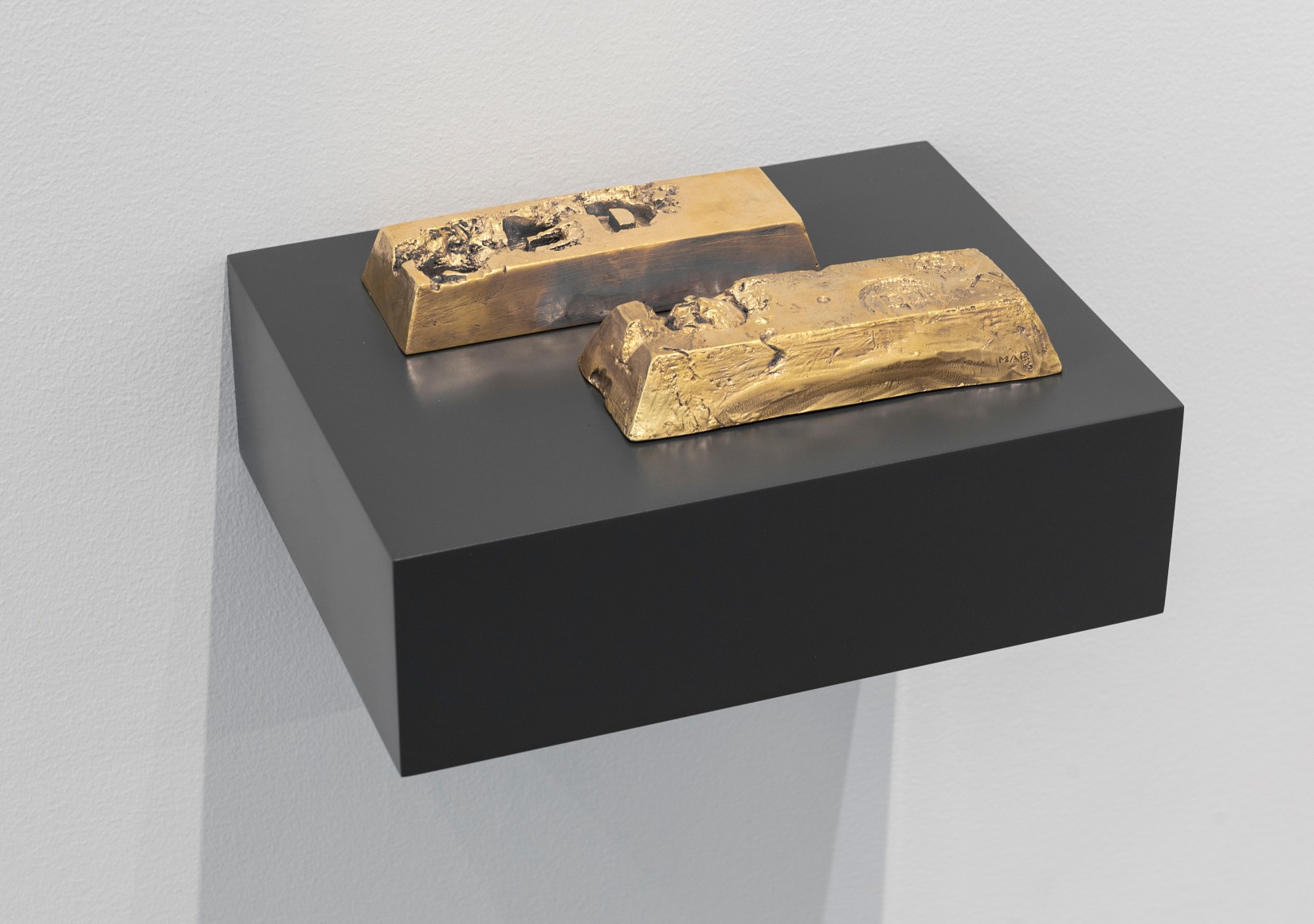 Miguel &Aacute;ngel Rojas, Sed, 2015. Bronze casted, gold and mercury-plated, 1 1/8 x 7 1/2 x 3 in. (3 x 19 x 7.5 cm.) each