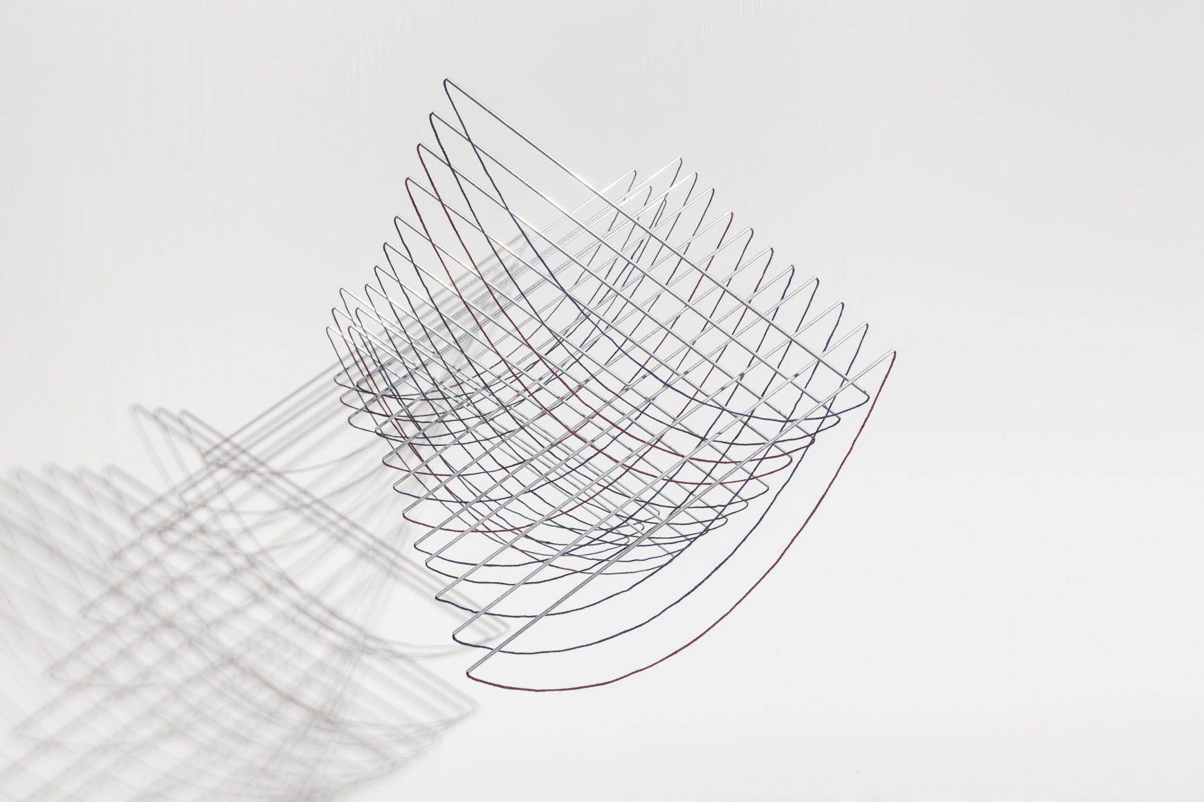 Elias Crespin, La Danza de las catenarias, 2019. Aluminum, wool, motors and electronic interface, 6 11/16 x 51 1/8 x 29 7/8 in. (17 x 130 x 76 cm.)