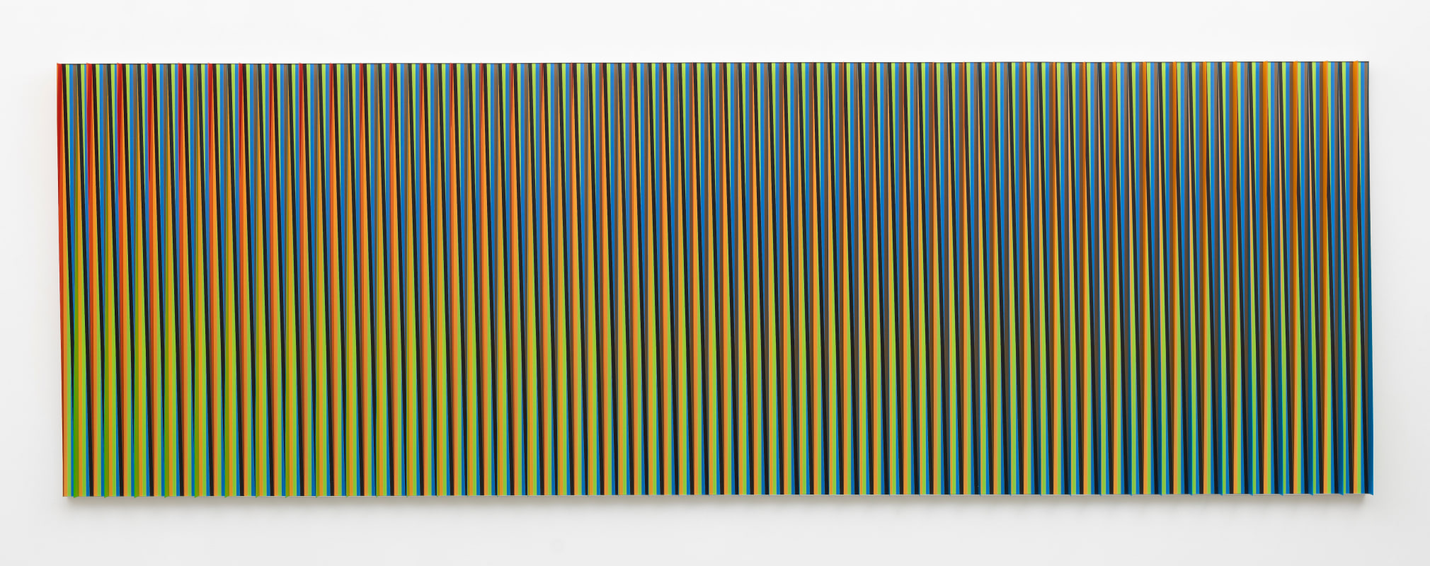 Carlos Cruz-Diez, Physichromie Panam 110, 2013. Chromography on aluminum, 59 x 177 ⅛ x 4 in. (149.9 x 449.9 x 10.2 cm.)