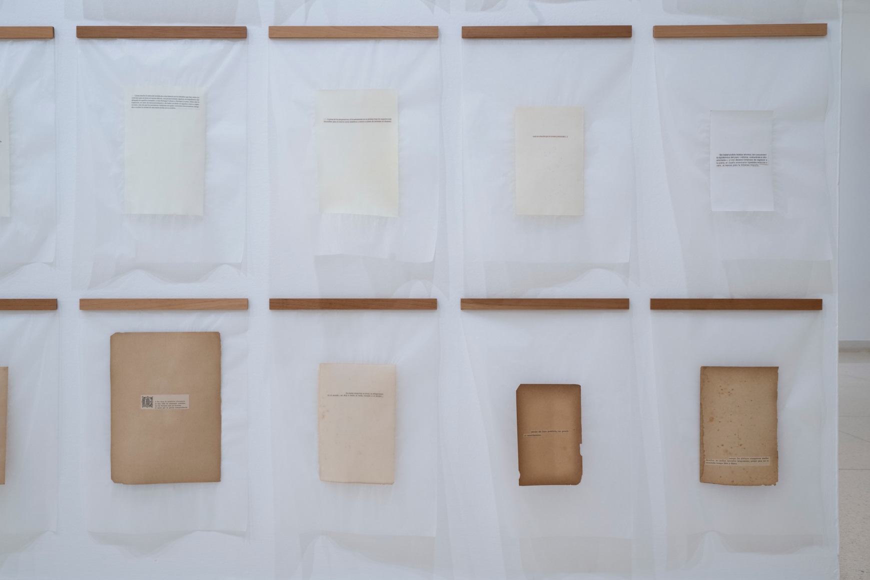 Reynier Leyva Novo, Biblioteca del Vacío (detail), 2021. 80 pieces: Laminated book pages of 9 gr. 100% Manila Japanese paper. Each page, mounted on cedar slats, Variable Dimensions, 11 3/4 x 15 3/4 in. each