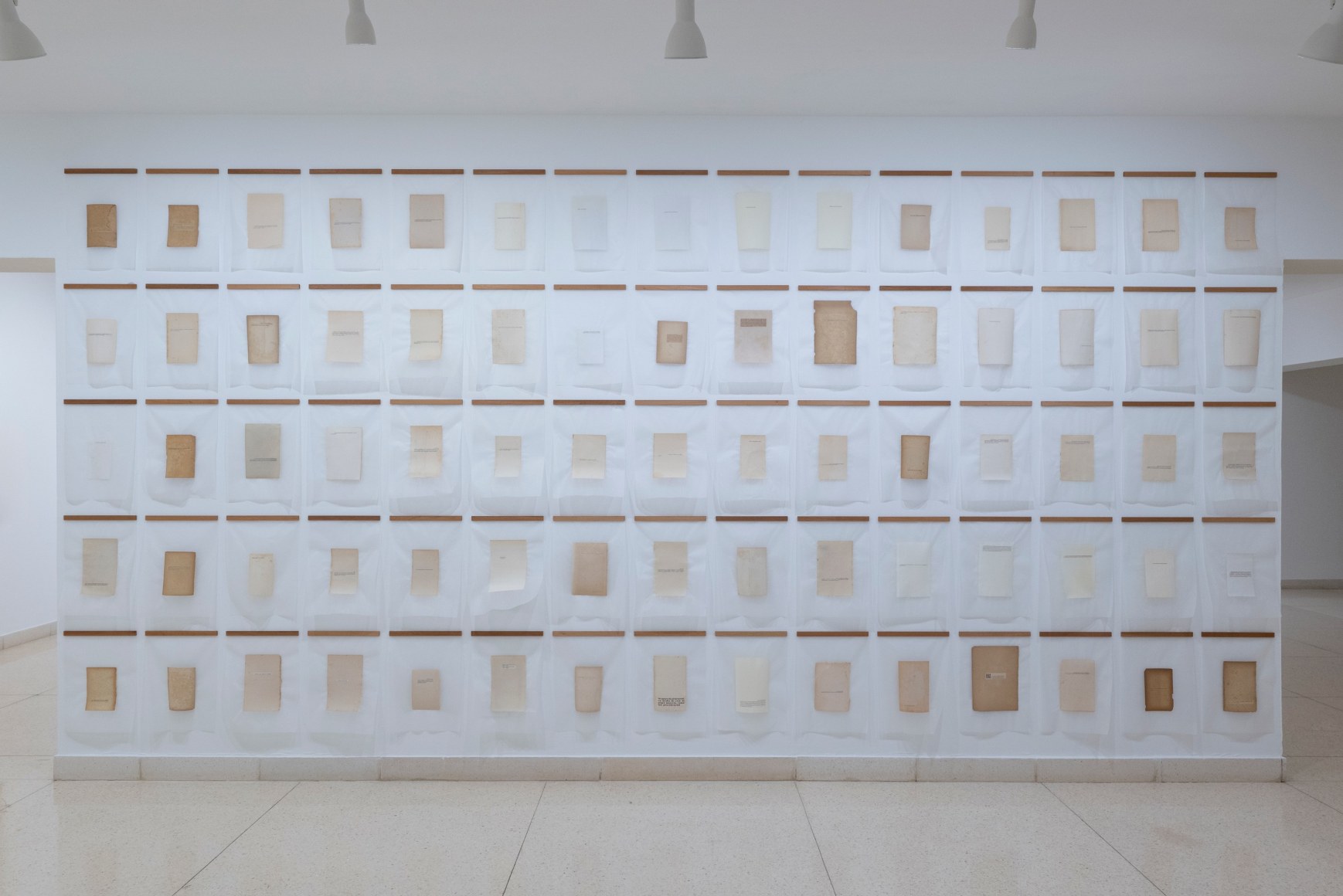 Reynier Leyva Novo, Biblioteca del Vacío, 2021. 80 pieces: Laminated book pages of 9 gr. 100% Manila Japanese paper. Each page, mounted on cedar slats, Variable Dimensions, 11 3/4 x 15 3/4 in. each