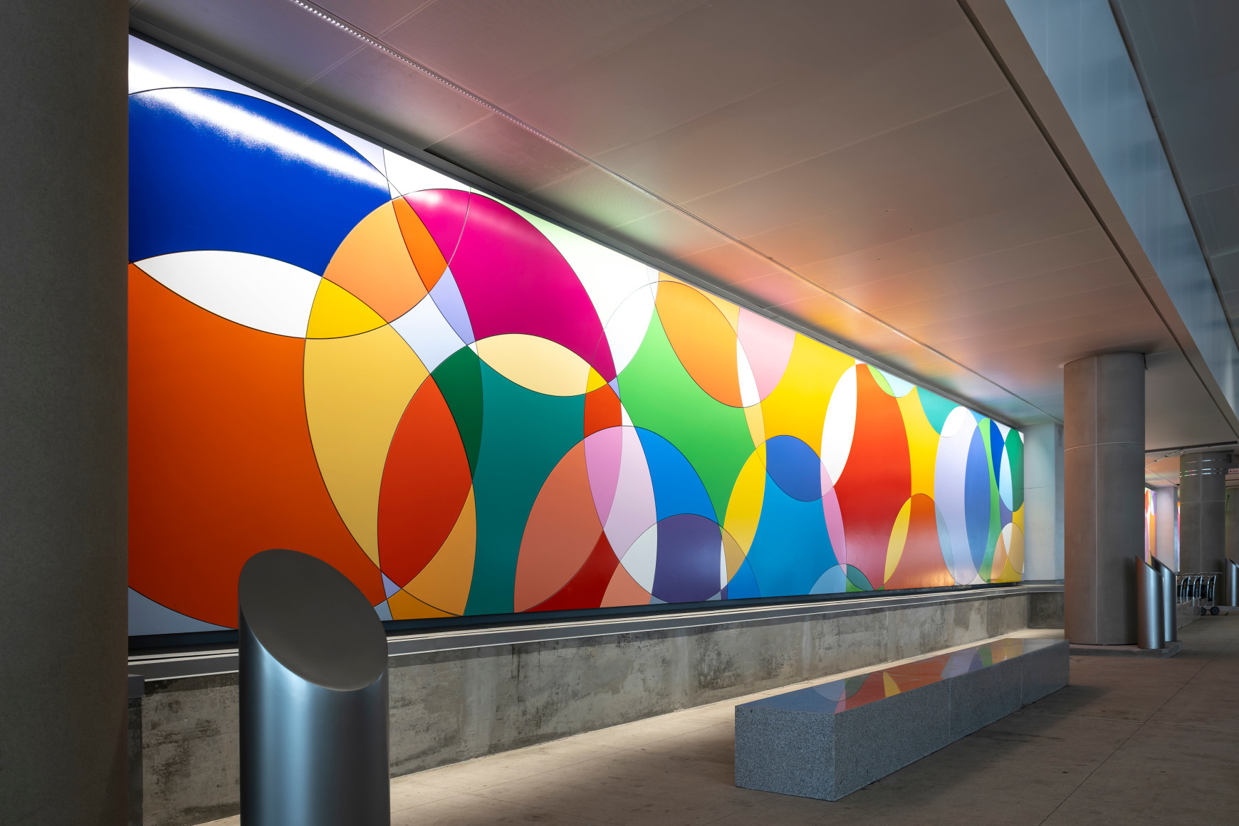 Graciela Hasper, Continuous Motion, 2025. Carbon steel and industrial paint, 9&#039;7&quot; x 208&#039;6&quot;. Permanent installation at George Bush Intercontinental Airport (IAH), Terminal E. Image courtesy of Houston Airports. Photos by Slyworks.