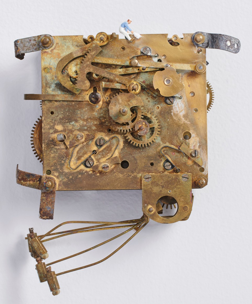Liliana Porter, To Make it Glow, 2022. Broken clock and figurine, 7 x 6 x 3 &frac12; in. (17.8 x 15.2 x 8.9 cm.)