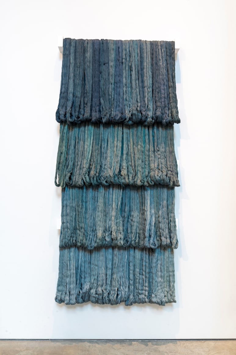 Sandra Monterroso, Expoliada III,&nbsp;From the series &quot;Wounds can also be dyed blue,&quot; 2016. Yarn dyed with indigo and wood, 70 13/16 x 31 1/2 x 4 11/16 in. (180 x 80 x 12 cm.)