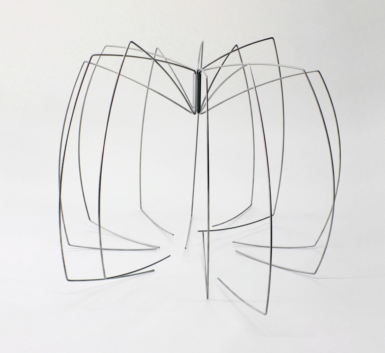 Magdalena Fern&aacute;ndez Arriaga, 3e009, Ed. 2/3 [Edition of 3 + AP], 2009. Stainless Steel, 12 legs, 1 cylinder and 12 screws, 43 1/16 x 54 1/8 in. (109.4 x 137.5 cm.)