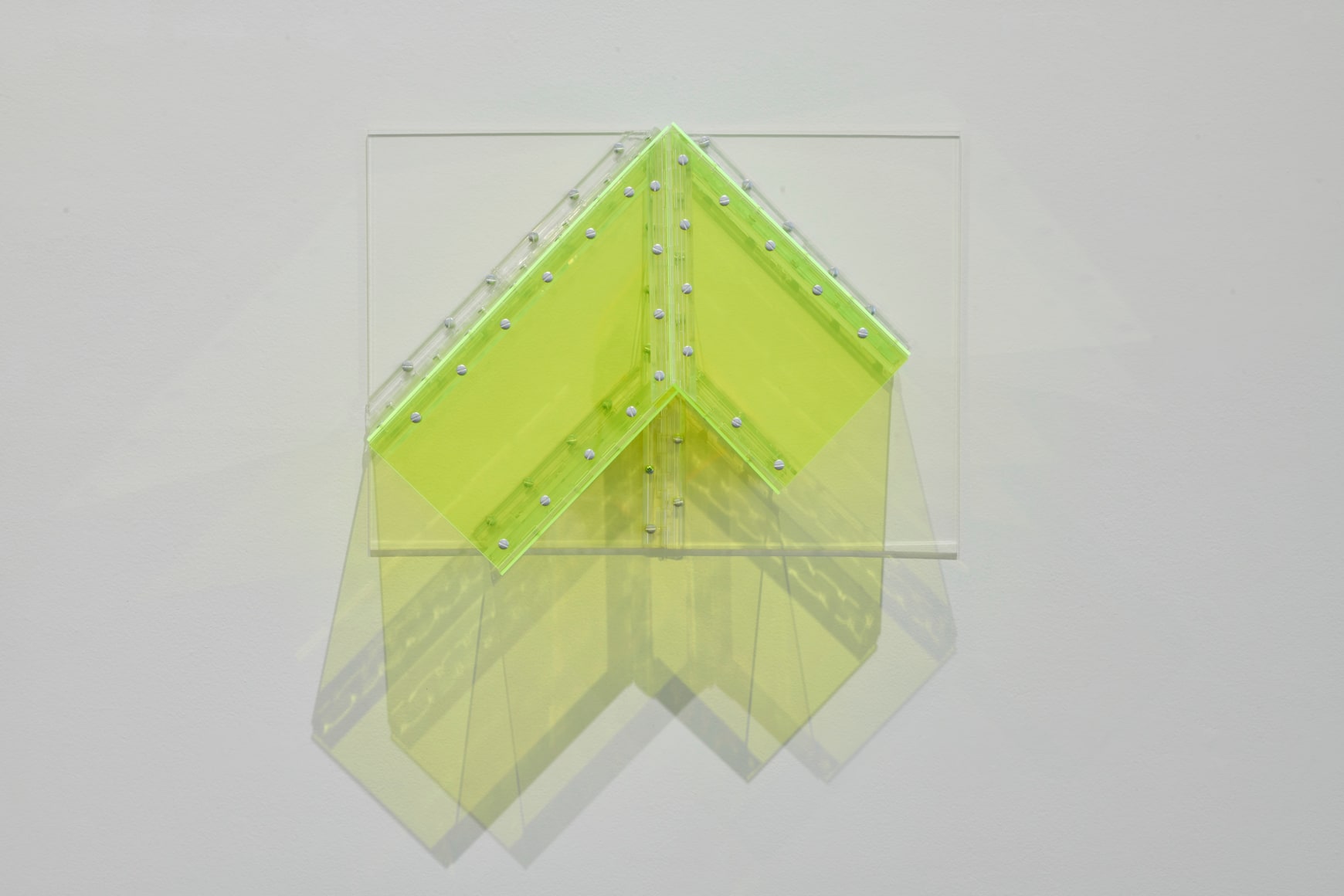 Marta Chilindron.&nbsp;Corner, 2008. Fluorescent green and clear acrylic and hinges, 17 x 24 x 9 in.