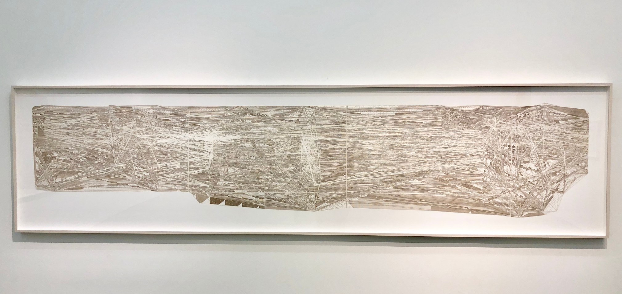 Estructura Autoincluida Recurrente en el Tiempo H, donde el polvo es l&iacute;nea y es polvo. (E.A.R.T.H. - H.E.A.R. - R.H.E.) - Rizoma Henkin Extra&ntilde;o, 2018.Cut out paper.&nbsp;44 x 195 1/2 x 6 in. (111.8 x 496.6 x 15.2 cm.)