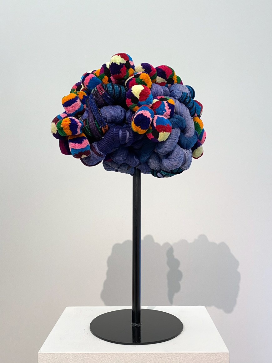 Sandra Monterroso, Vida azul. From the series &quot;Wounds can also be dyed blue.&quot;, 2019. Sculpture, yarn dyed with indigo, and Tocoyales [headdresses made of textiles, part of Mayan clothing in western Guatemala]. Assembled in steel., 23 9/16 x 23 9/16 x 15 3/4 in. (60 x 60 x 40 cm.)