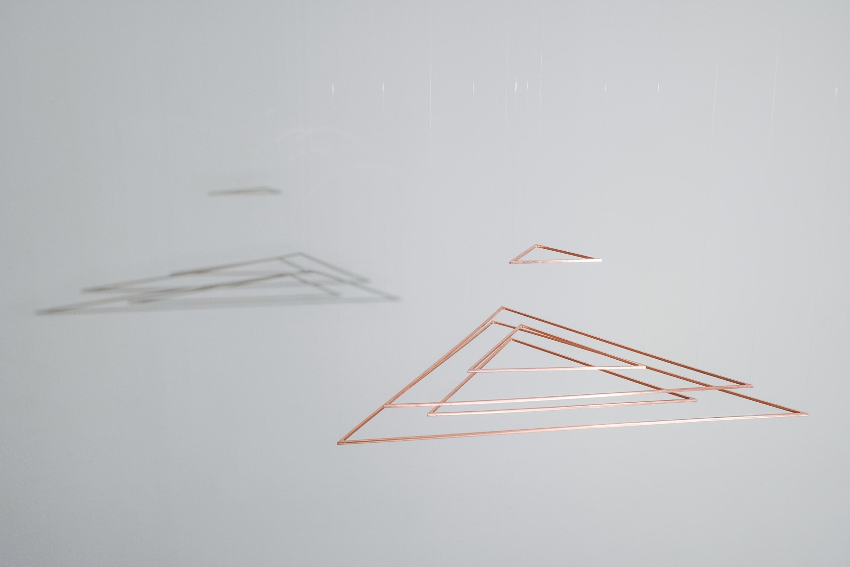 Elias Crespin, Trianguconcéntricos Cuivre, 2021.&nbsp;Copper, nylon, motors, computer, electronic interface, 19 7/8 x 17 1/8 in., Edition of 3.&nbsp;