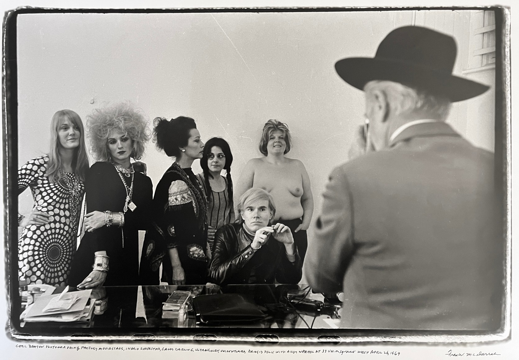 Fred McDarrah, Cecil Beaton photographing Andy Warhol with Factory movie stars.  Left to right: Ingrid Superstar, Candy Darling, UltraViolet, (unidentified woman), and Brigid Polk. April 26, 1969.