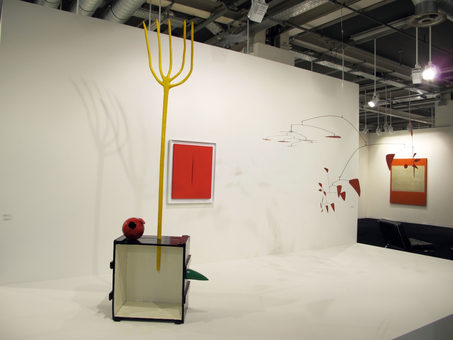 Installation view of Art Basel | Basel 2013, booth H5.  &copy; 2018 Calder Foundation, New York / Artist Right Society (ARS), New York. &copy;Helly Nahmad Gallery NY.