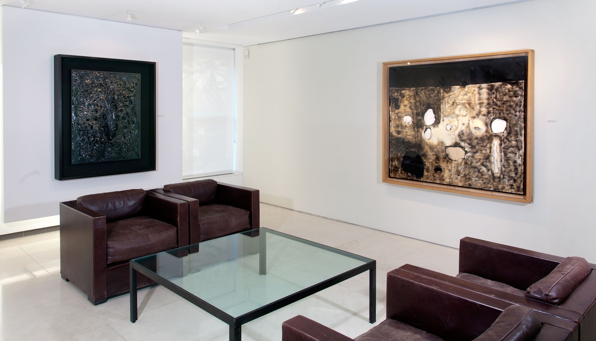 Installation view of The Wounded Canvas: Burri Fontana Manzoni T&agrave;pies. Photography by Guenter Knop. &copy;Helly Nahmad Gallery NY.