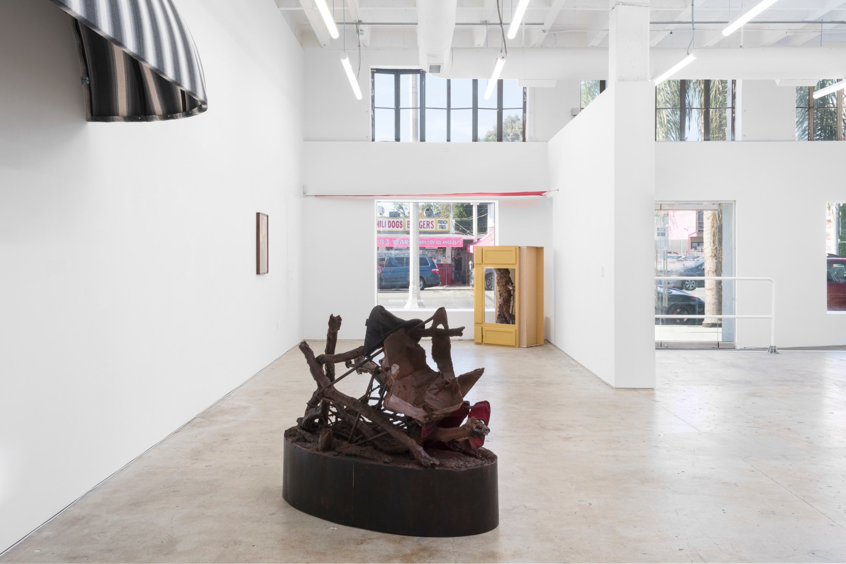 Brandon Ndife, What's the sun to a raisin, 2022., Installation view