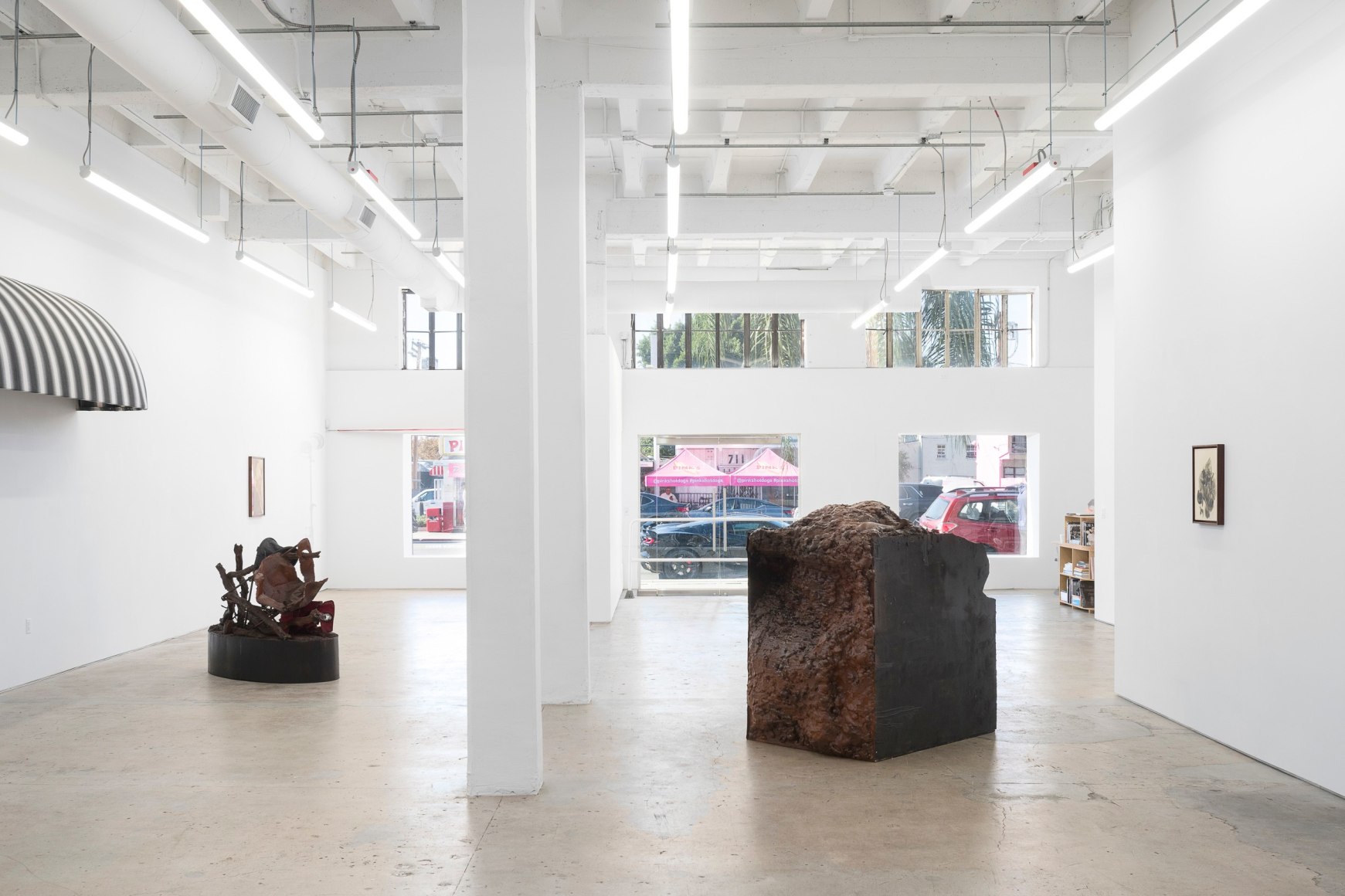 Brandon Ndife, What's the sun to a raisin, 2022., Installation view