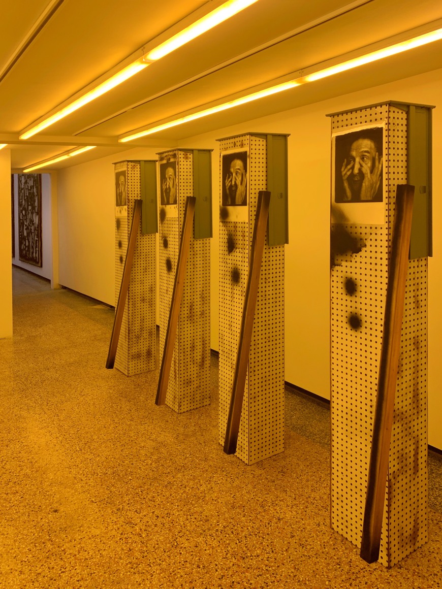 Downstairs back room - Exhibiting four 76 in x 14in x 46in sculptures by Phil Wagner w/ amber gallery lighting.