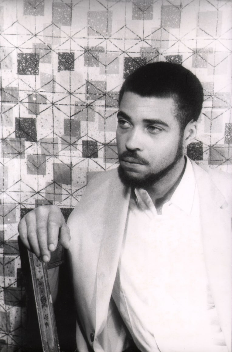 15. Carl Van Vechten, James Earl Jones, ​1961. Seated, waist-length portrait with subject looking towards the left of the frame with his right arm resting on the back of the chair.