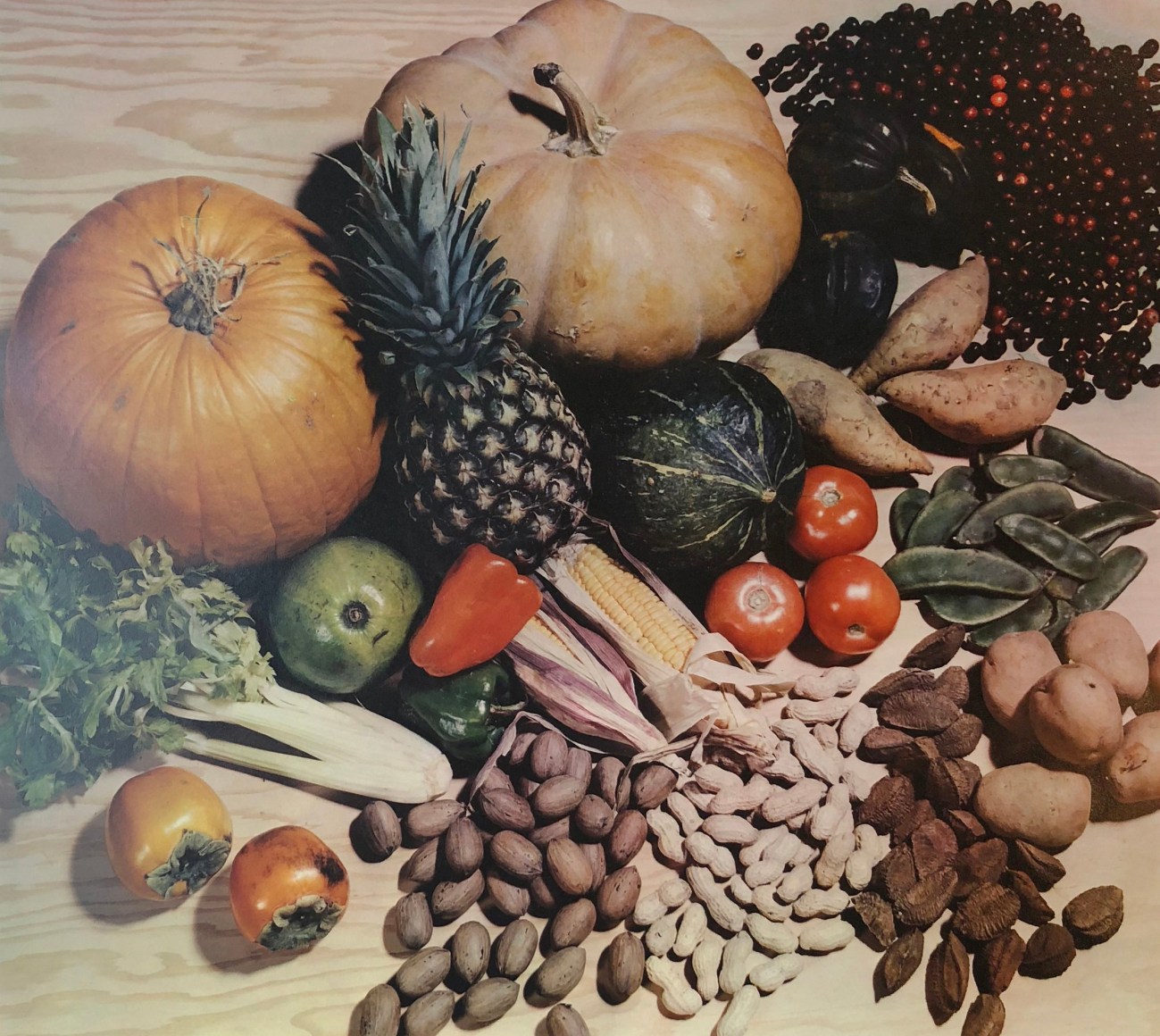 Harold Haliday Costain, Autumn Harvest, ​c. 1937. Color still life composition with various fruits, vegetables, and nuts.