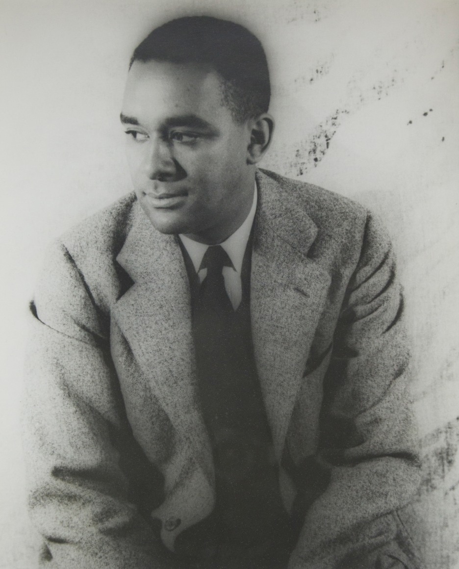 14. Carl Van Vechten, Richard Wright, ​1939. Seated portrait of subject in jacket and tie, looking to the left of the frame.
