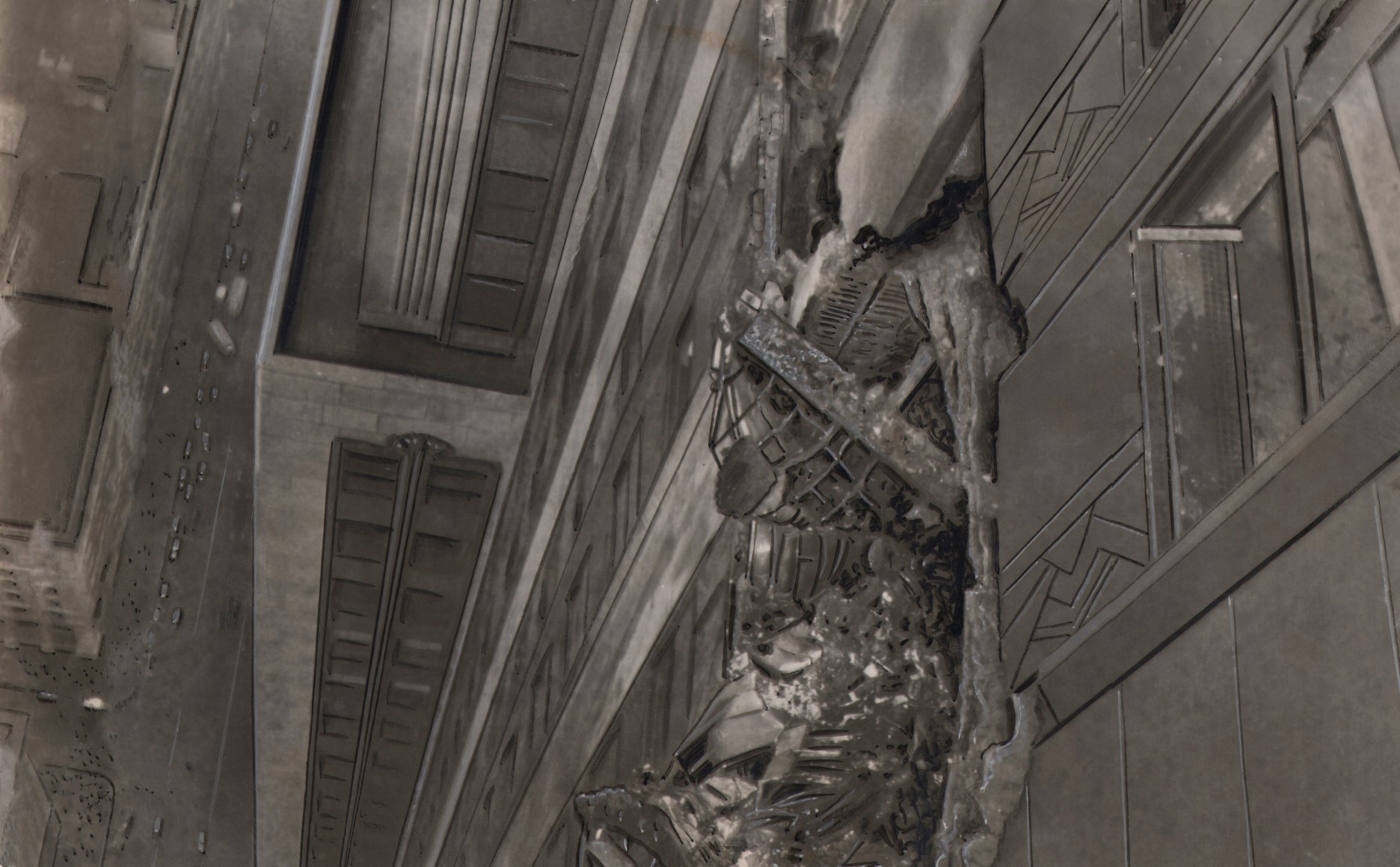 01. AP Wirephoto, Where bomber crashed into Empire State Building, 1945. Looking-down detail of damaged building facade with street below visible in left of frame.