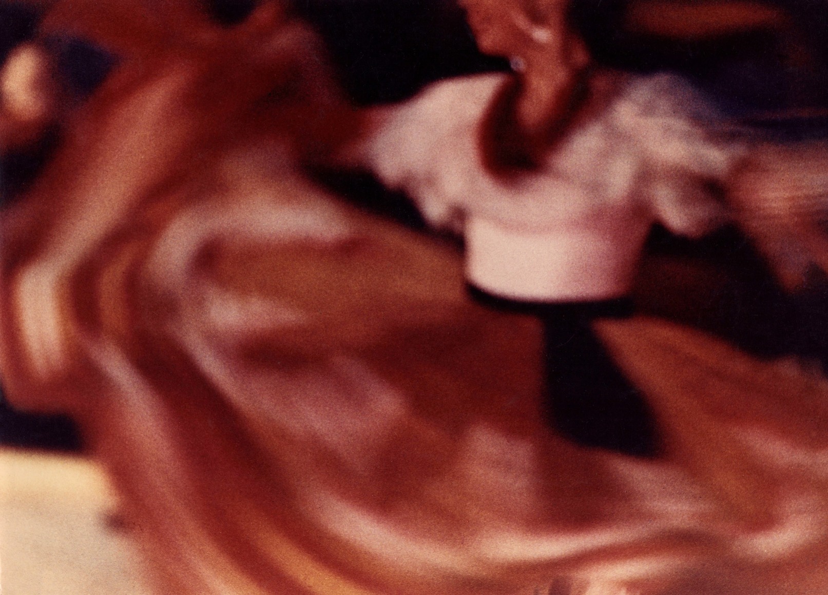 Giuseppe Goffis, Mexican Fiesta, ​c. 1960. Color photograph of a female torso in traditional dress with skirt splayed out, blurred with motion from dancing.