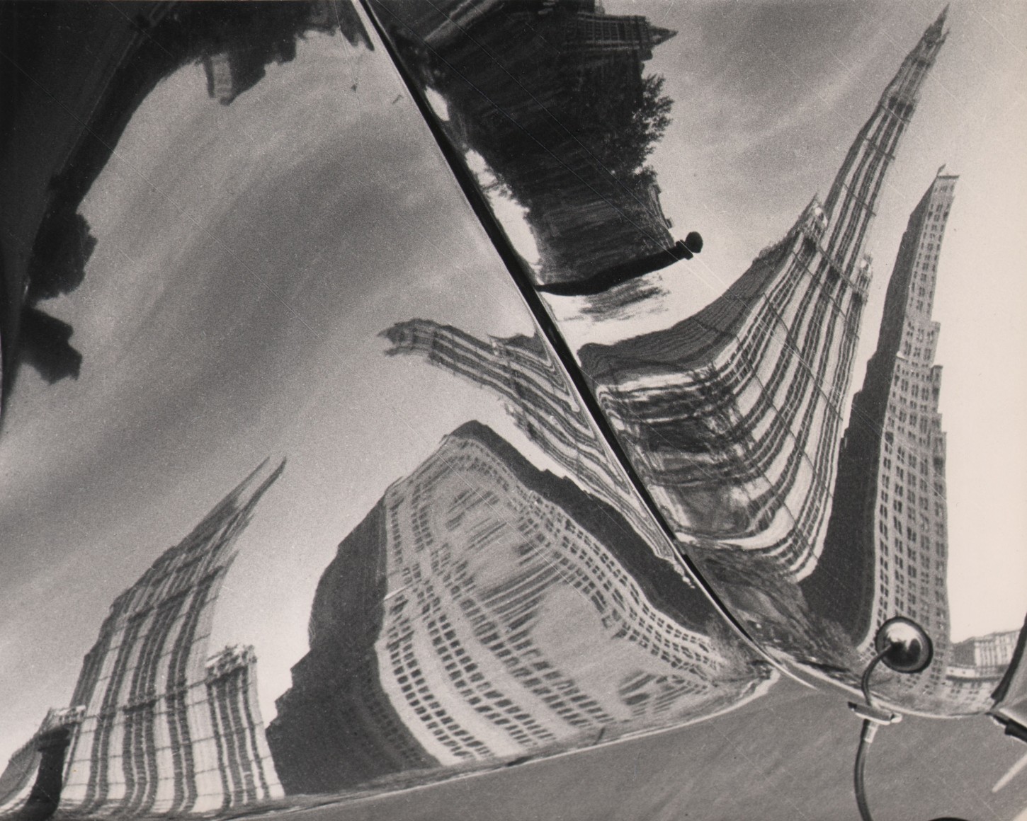 33. Fritz Neugass, Untitled, ​c. 1948. Distorted reflection of skyscrapers.