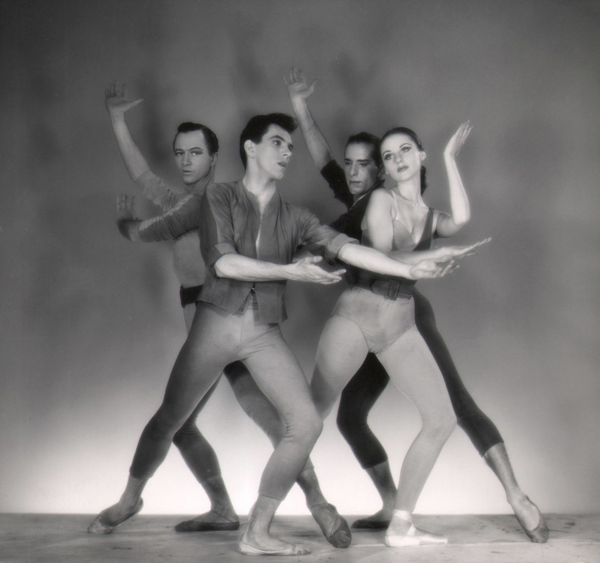 George Platt Lynes, Age of Anxiety: Todd Bolender, Roy Tobias, Jerome Robbins, Tanaquil LeClercq, ​1950. Four dancers pose, two in front and two behind, with arms and legs in various directions.