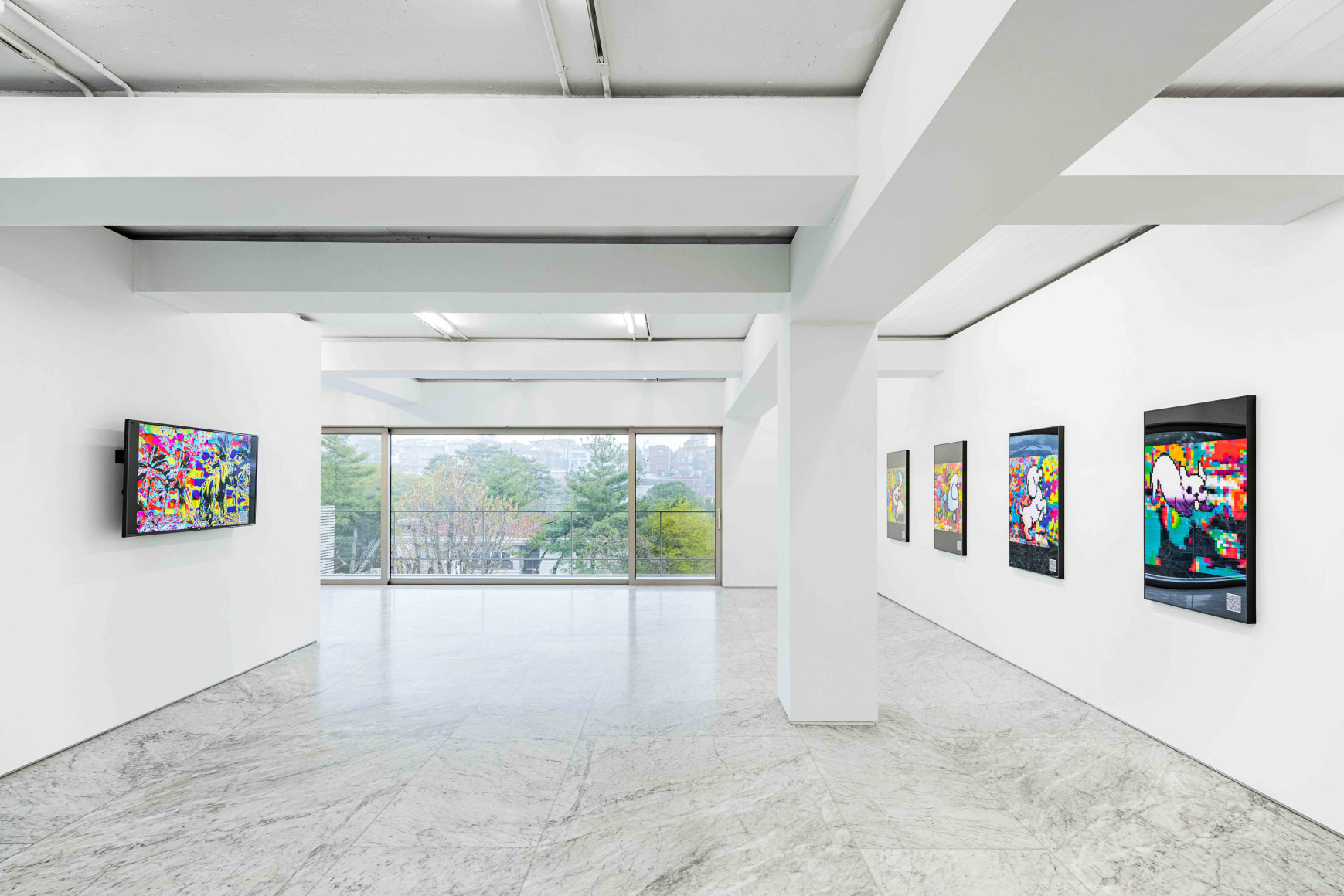 Installation view of Cody Choi: “HELLO KITTY” Database Painting Totem + NFT at PKM & PKM+., Courtesy of PKM Gallery.