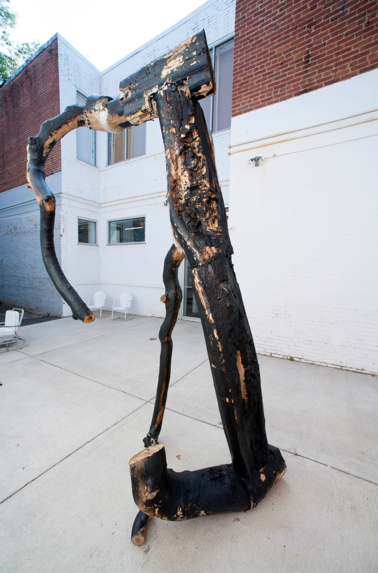 PAT McGOWAN Untitled 2013, wood, asphaltum, 137 x 43 x 64 inches. Installation view: CONNERSMITH.